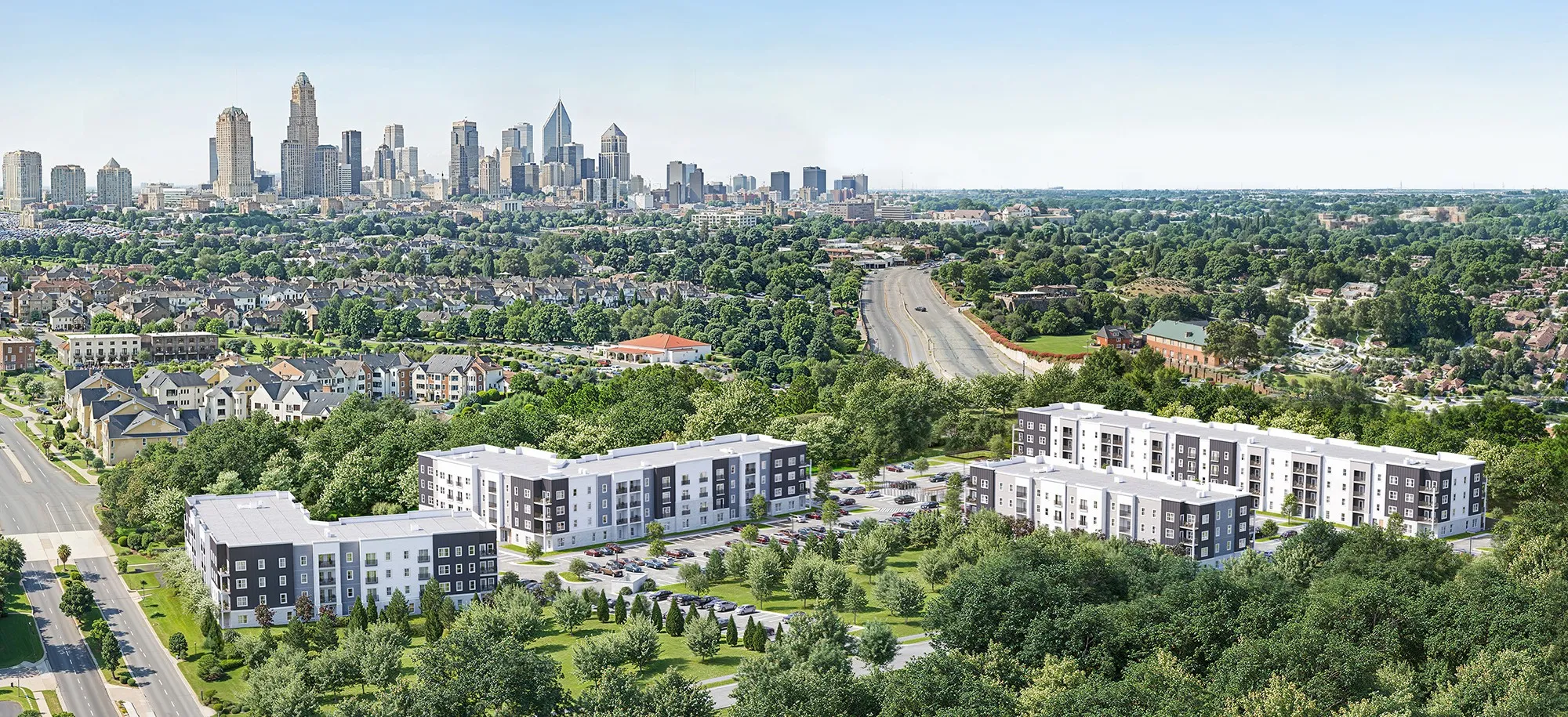 Aerial view of Renza neighborhood showcasing the city's skyline and urban landscape from above.