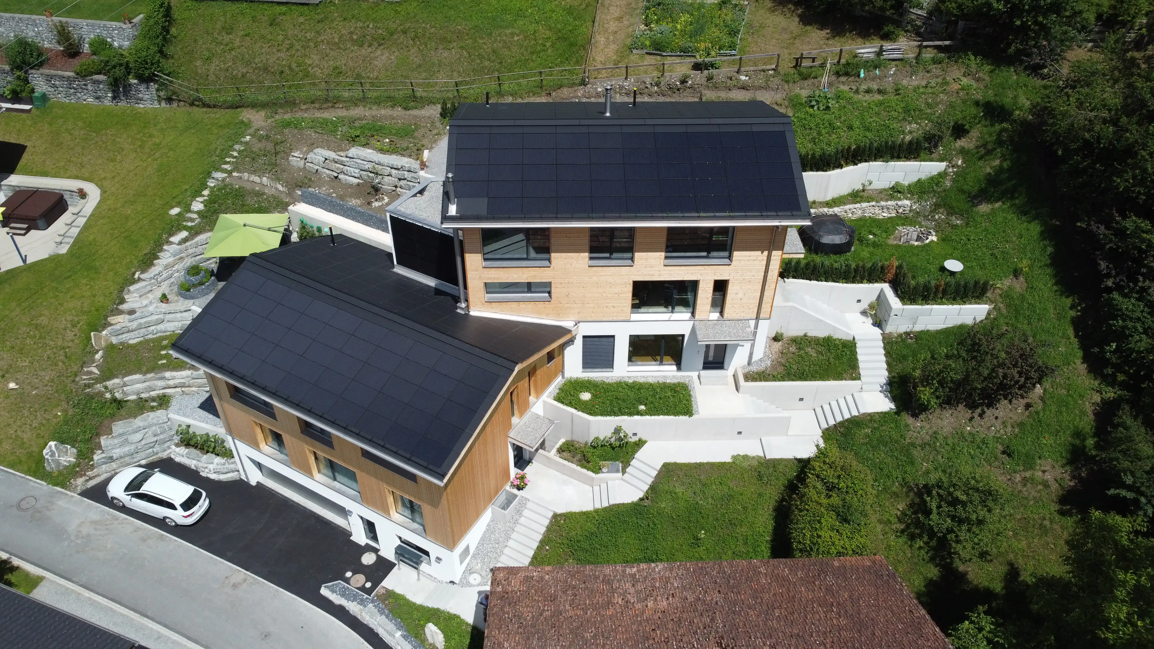 Neubau Zweifamilienhaus Fanas mit PV Anlage - Niggli Architektur Grüschject