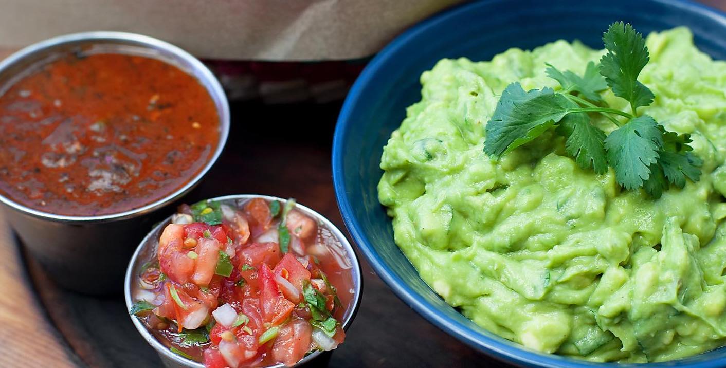 Freshly made guacamole at Blue Plate Taco in Santa Monica, served with crisp tortilla chips, highlighting the restaurant’s focus on fresh, Baja-inspired ingredients.