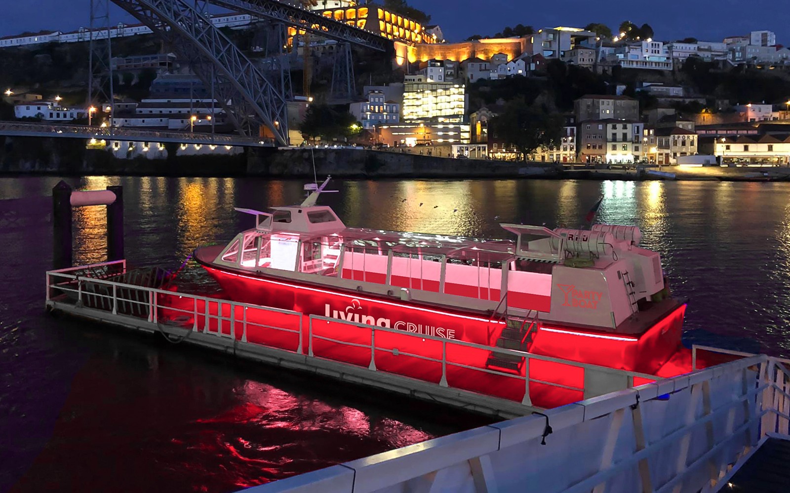 Barco de festa ancorado no Rio Douro à noite, com as luzes da cidade do Porto ao fundo.