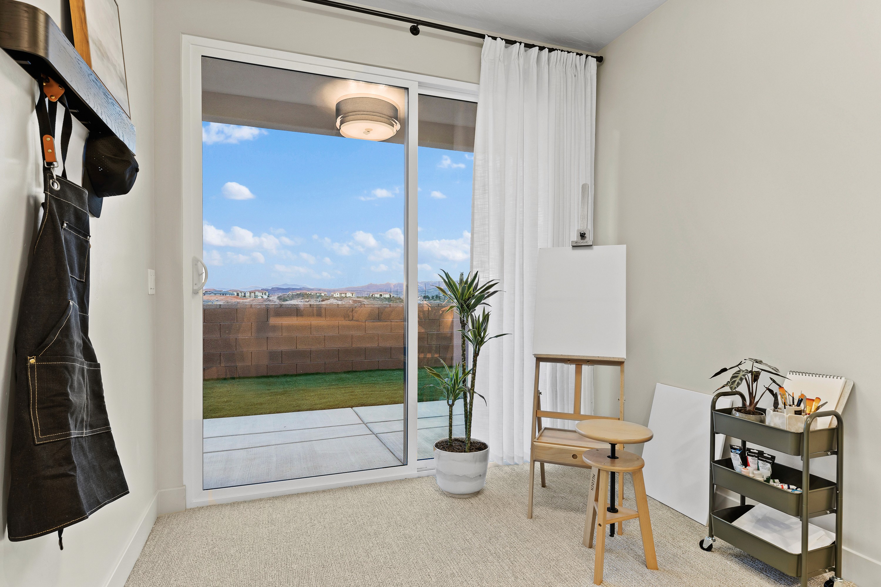 Flex space within the primary bedroom of The Painted Horizon in Hurricane, Utah designed for reading, working, or relaxing.
