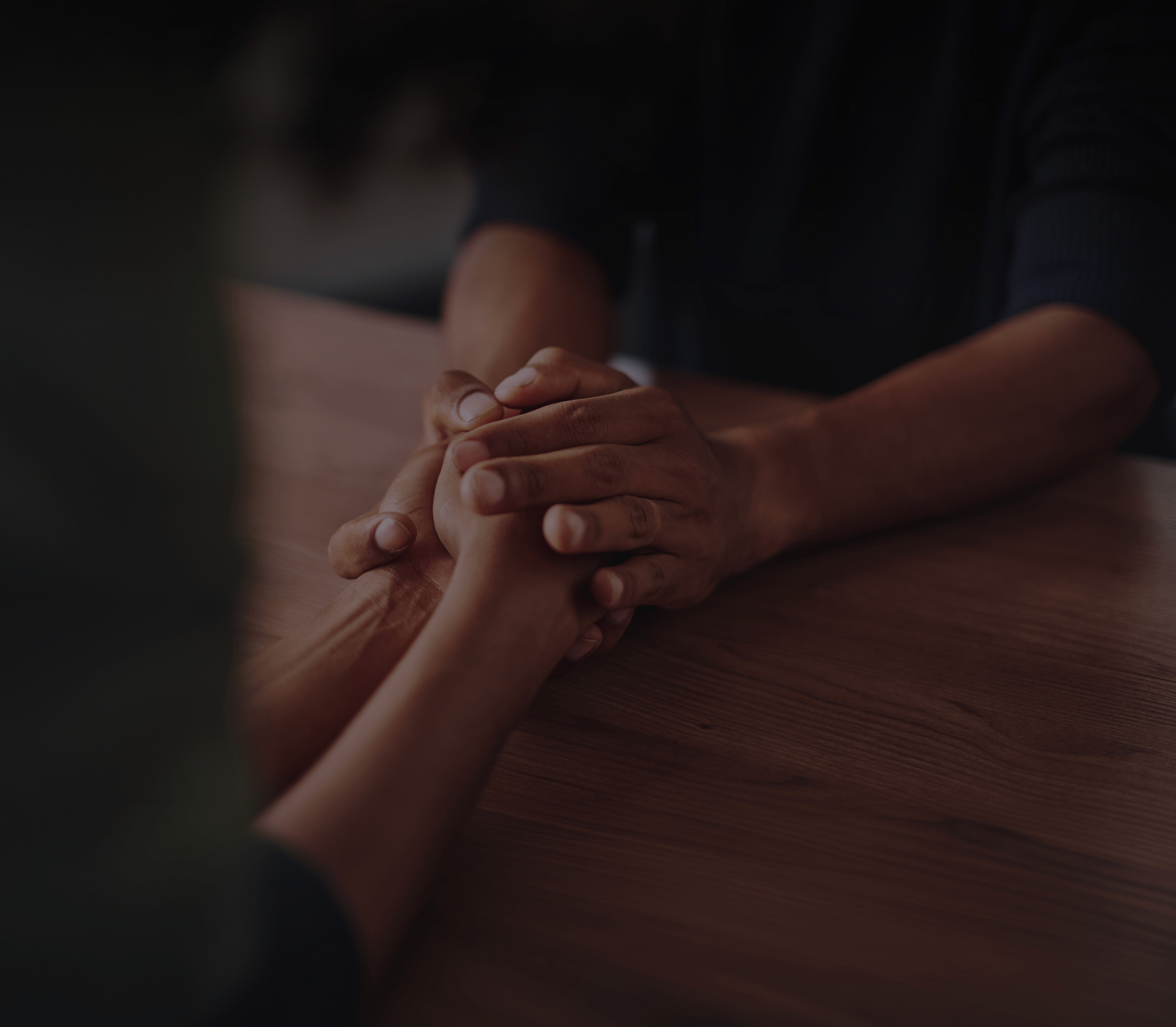 two people holding hands