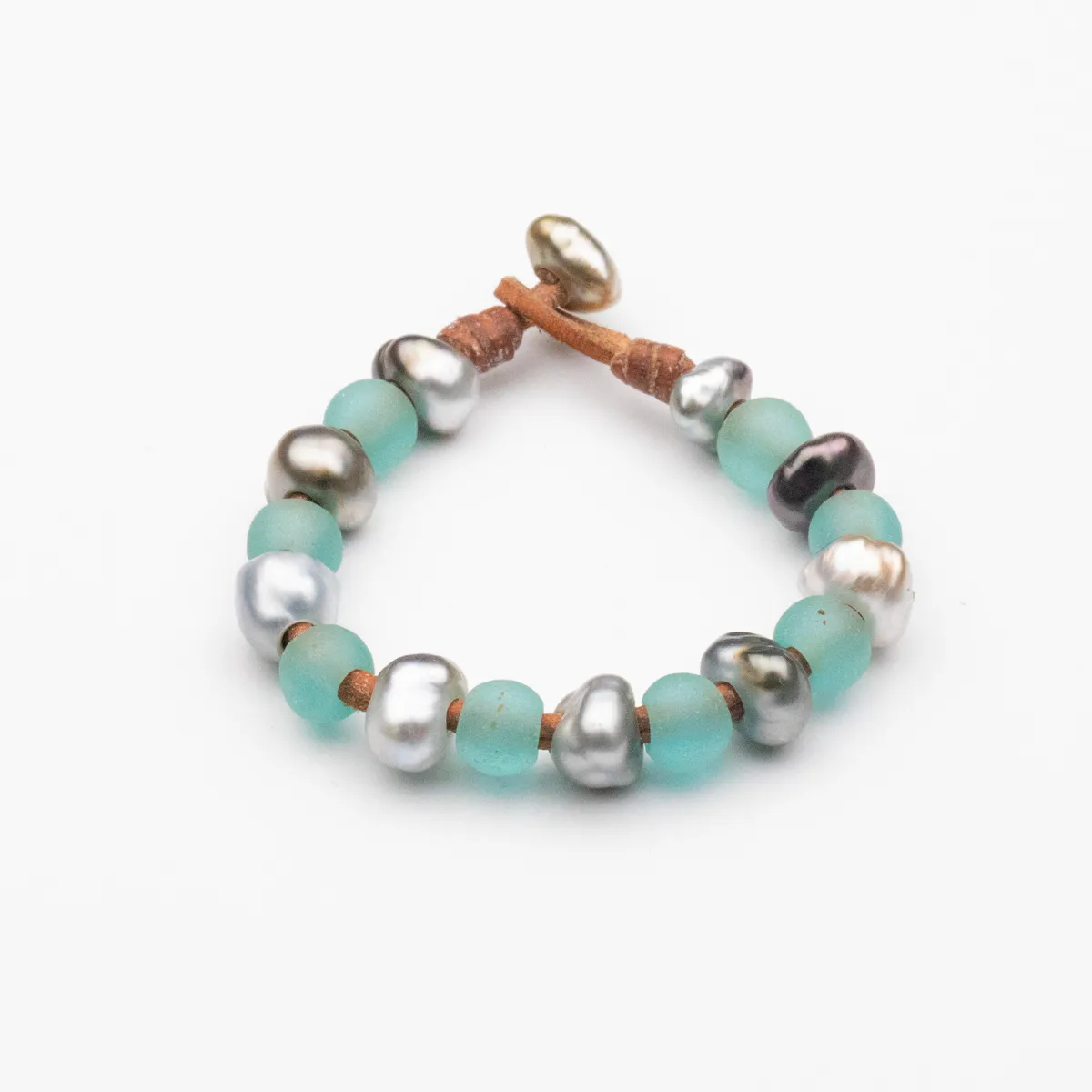 Glass Bead and Keshi Pearl leather bracelet with seafoam green beads and silver-gray baroque pearls on natural leather cord — Manos de Oro Saint Barth