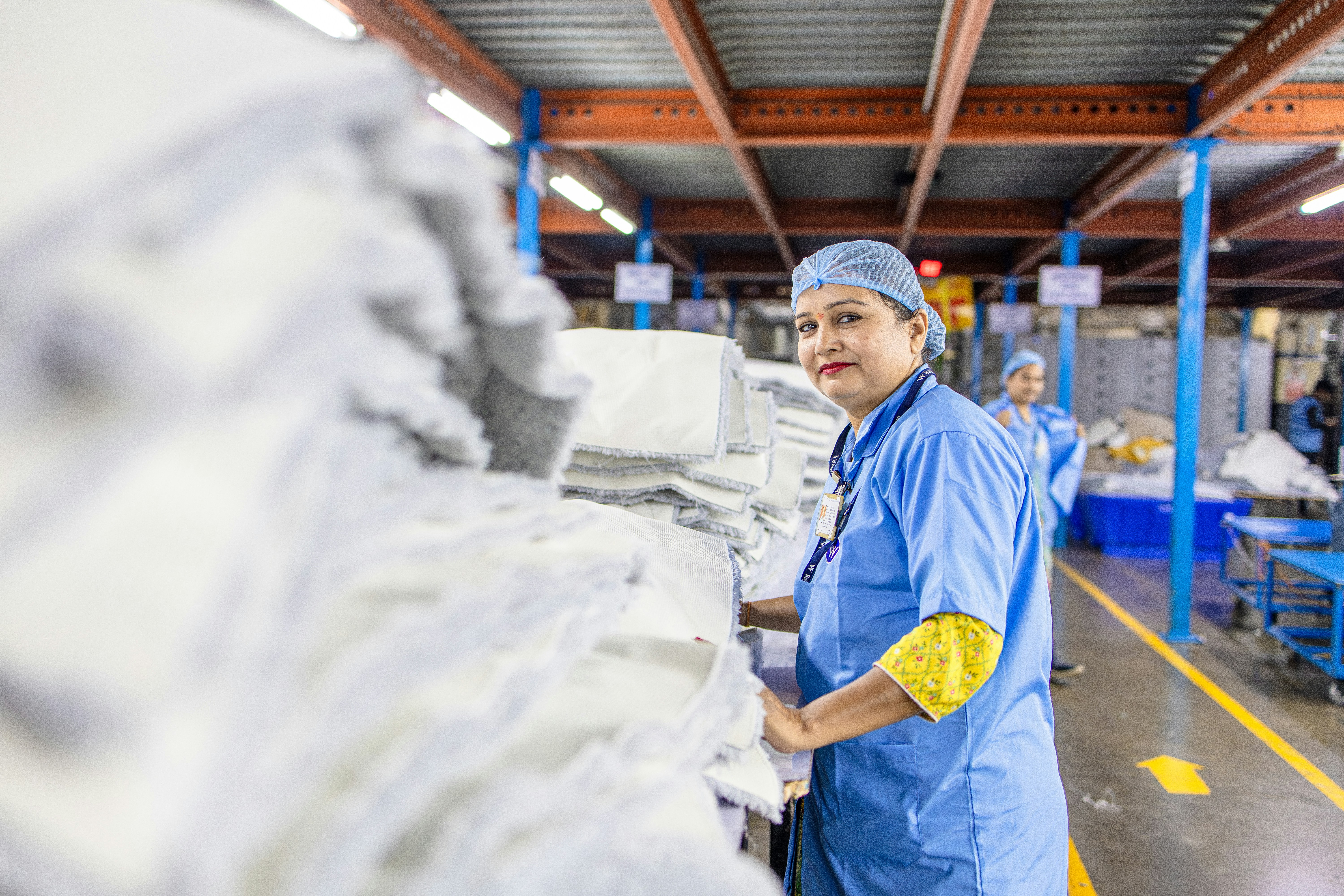 Factory workers sorting and organizing materials.