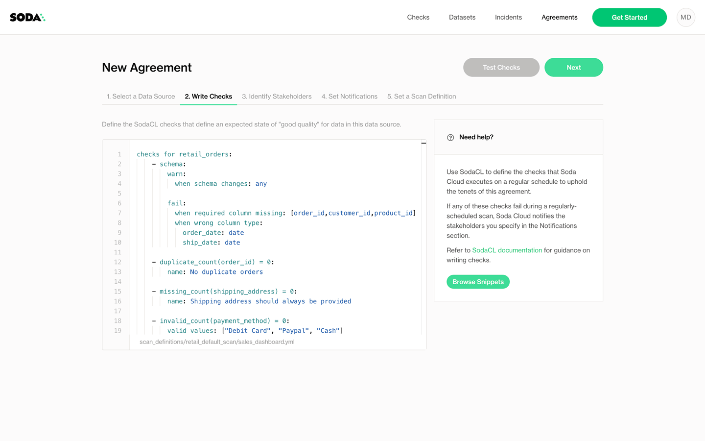This is a data consumer in Soda Cloud creating an agreement, leveraging suggested code snippets.