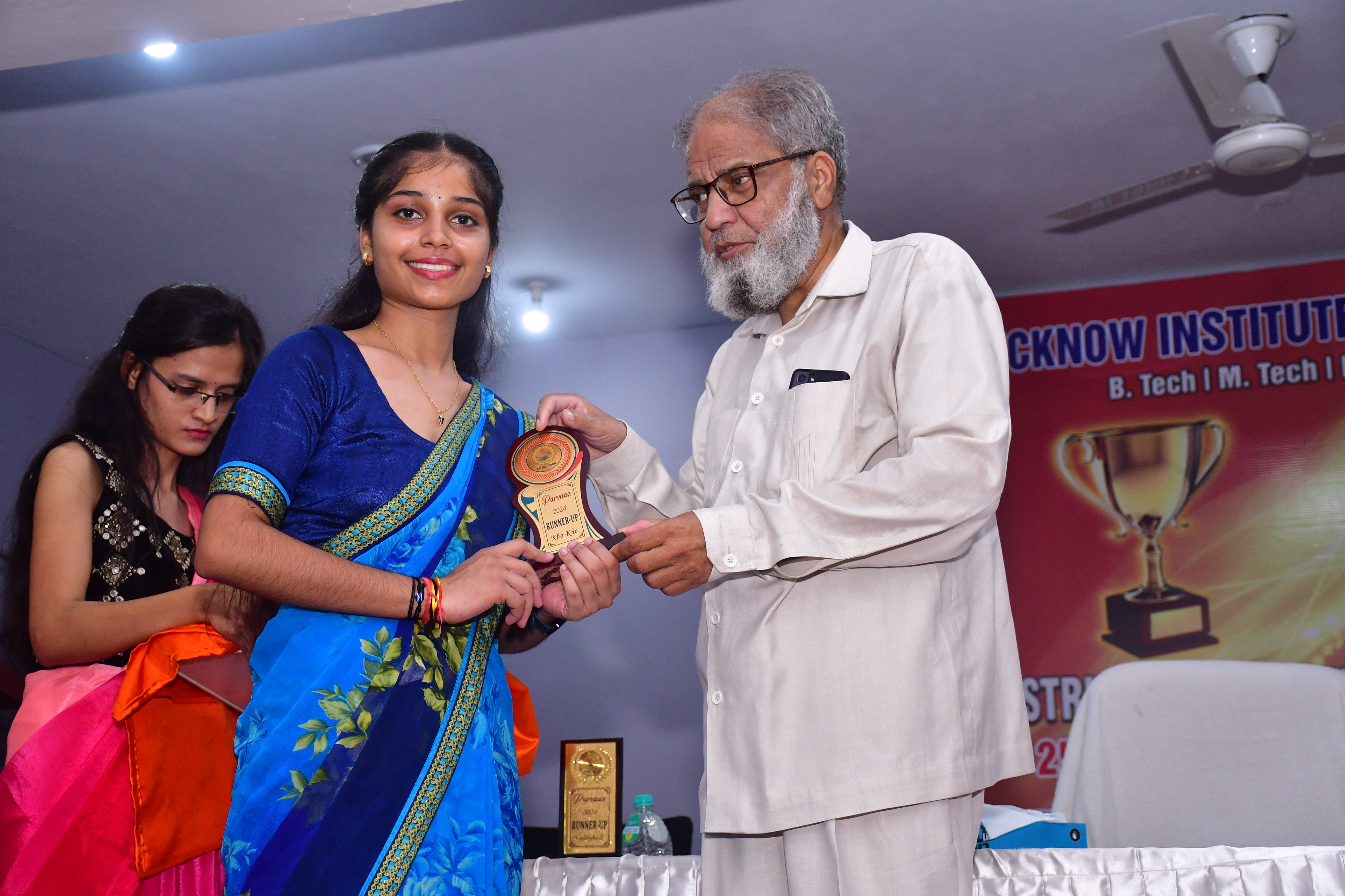 people sitting on chair in front of laptop computers