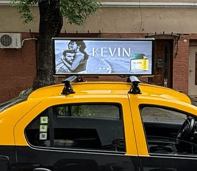 A man standing with Sufboard