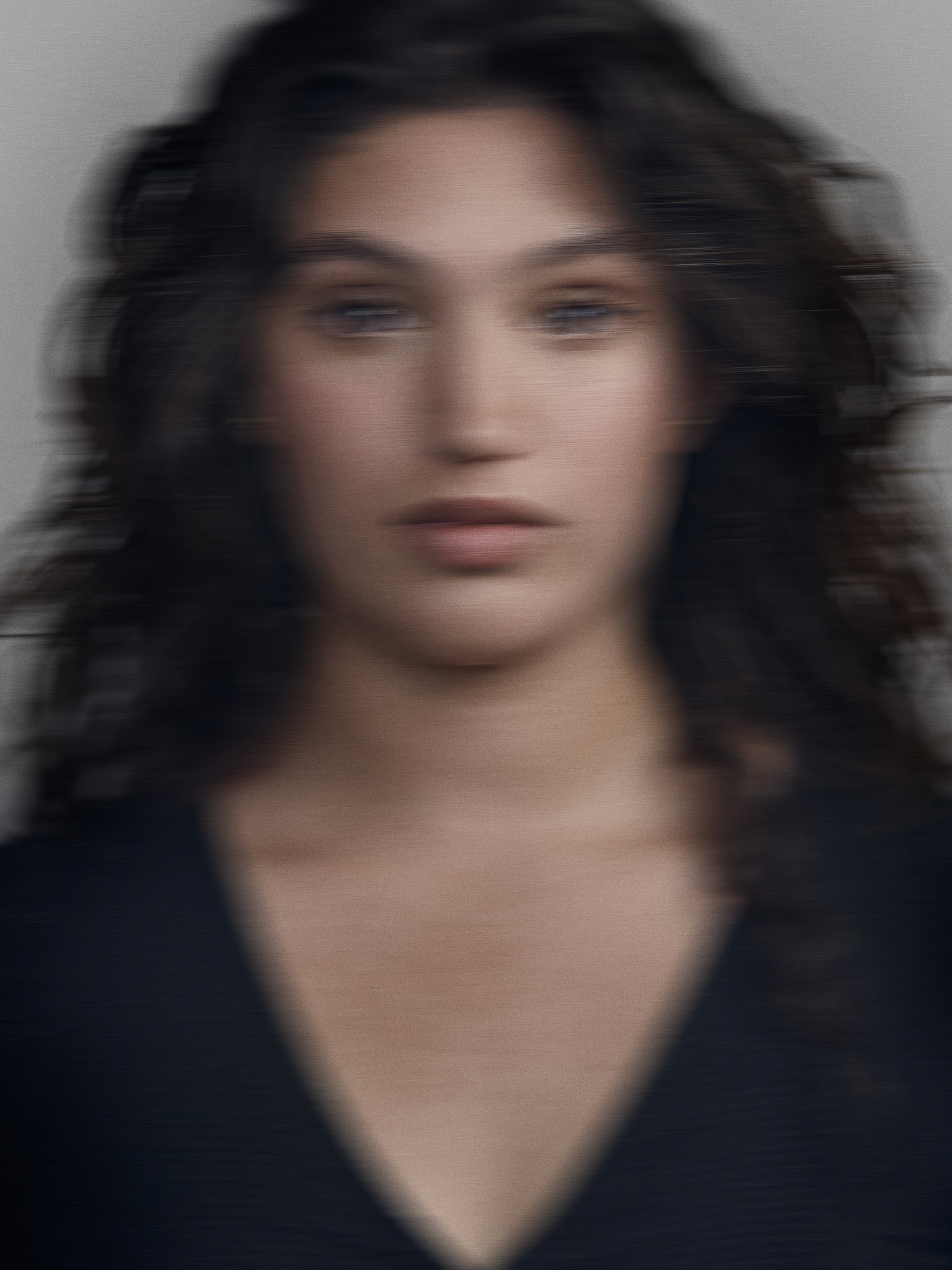 Creative editorial portrait of director of photography and cinematographer Reyna Hope. The image is expressive, shot with motion blur in Craig Mulcahy’s New Orleans studio. 