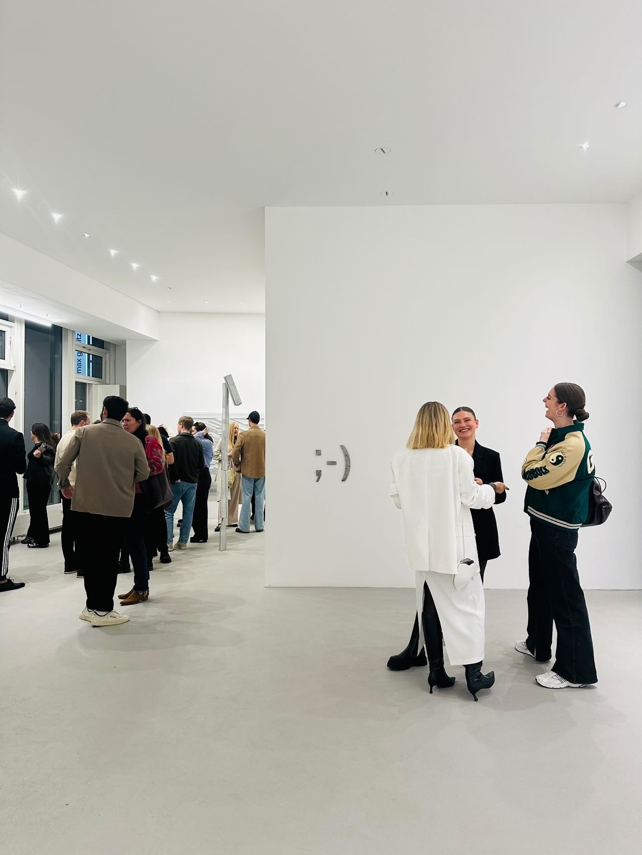 Entrepreneurs engaging in a lively discussion during a Bizz Buzz networking event.