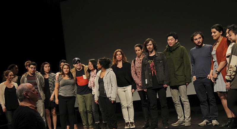 group photo of people on a stage
