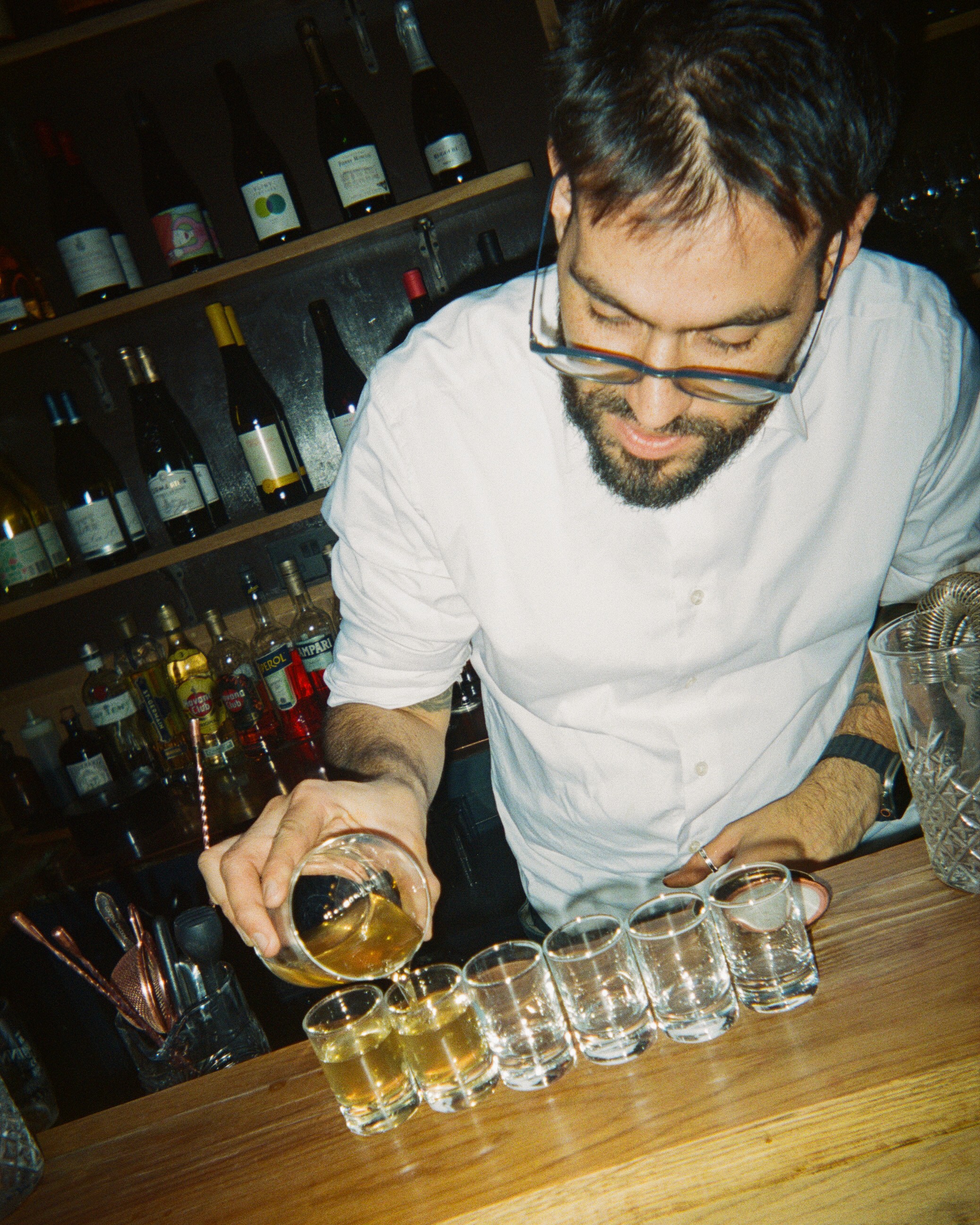 white drop bottle on white surface