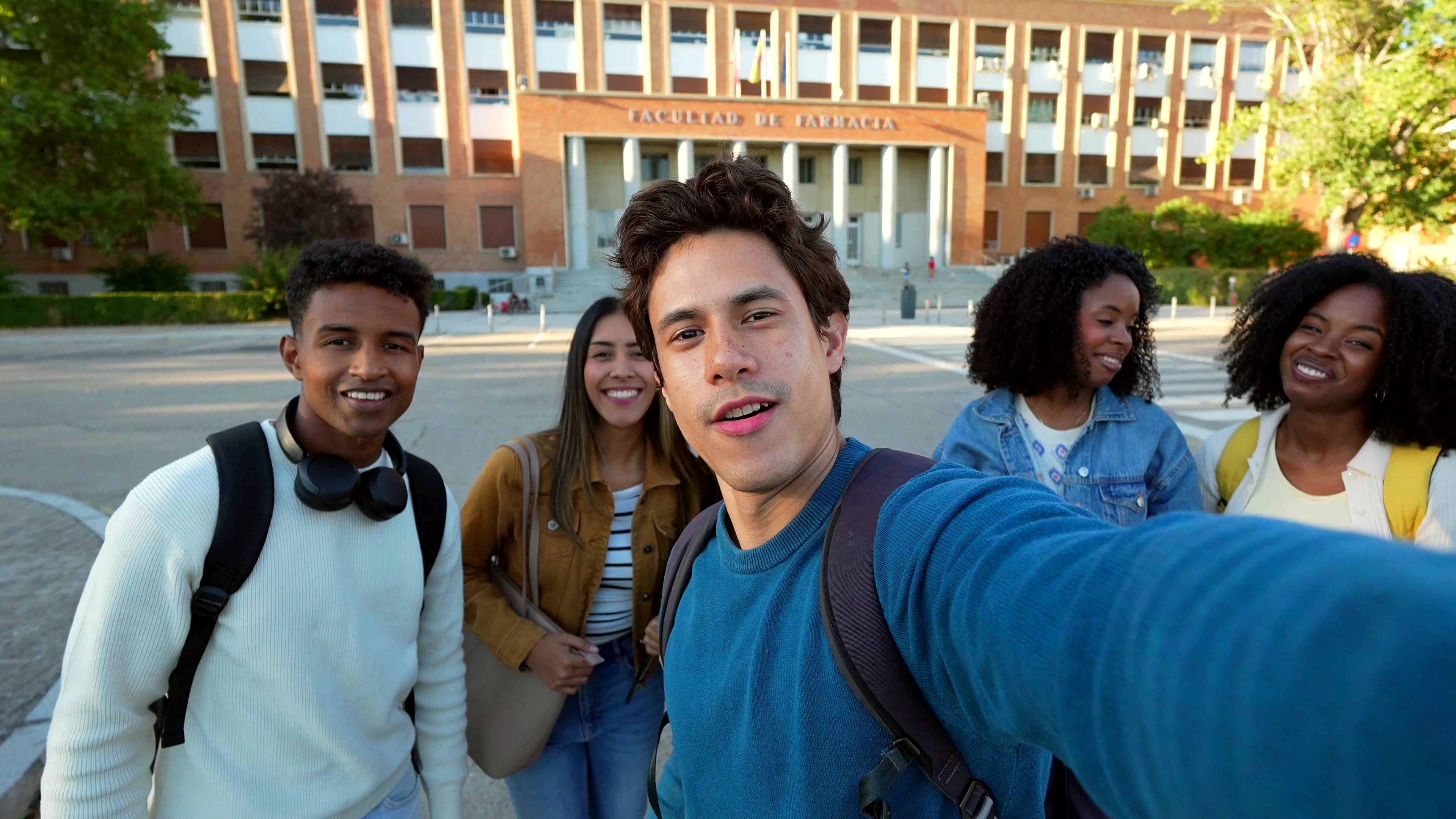 Happy Multiracial University Students Vlogging on Campus