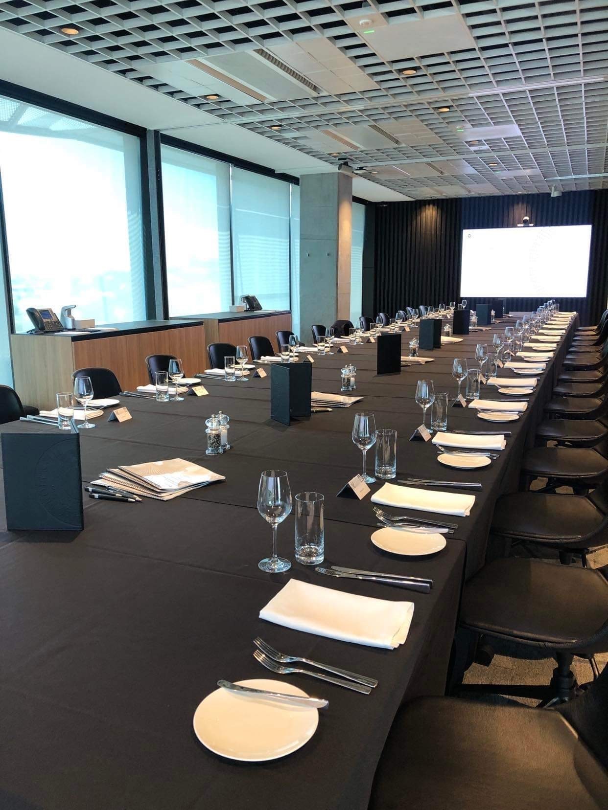 Black clothes conference table for a boardroom meeting lunch