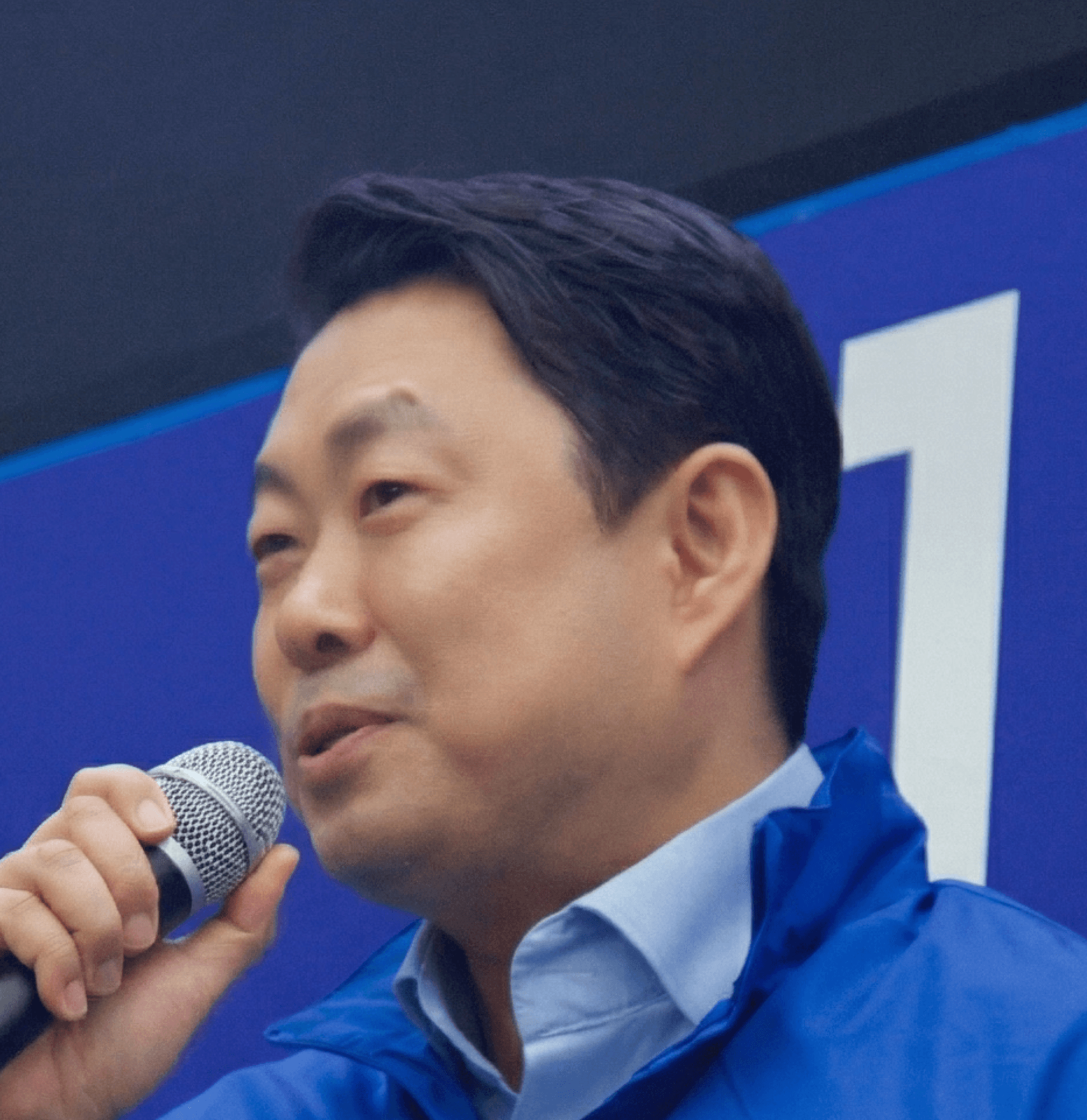 Portrait of a young guy on a blue background