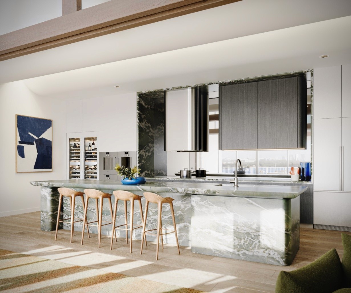 Designer kitchen with marble island, premium appliances and waterfront outlook