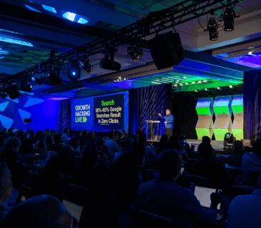 A Man Talking using Microphone in the Conference Room