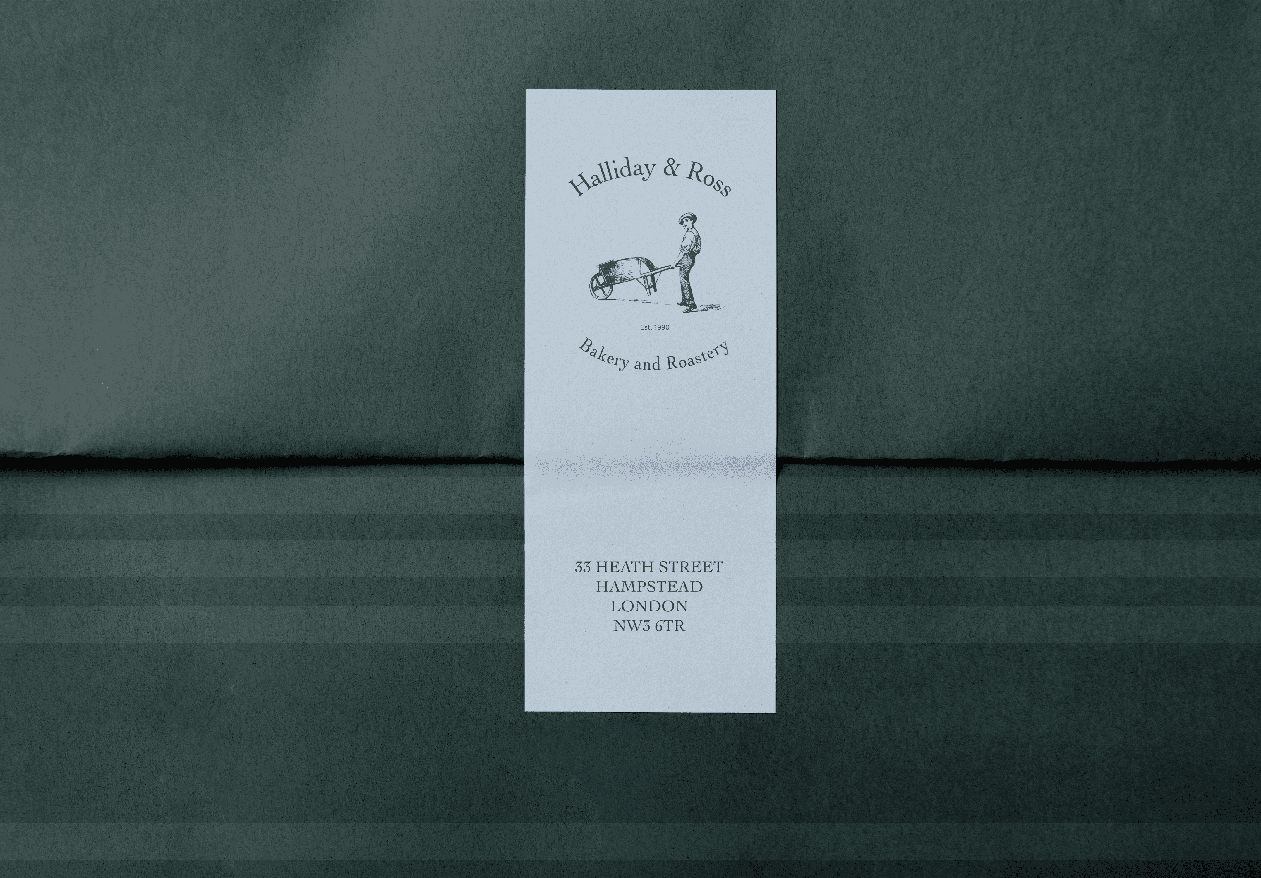 Halliday and Ross Bakery and Roastery cafe signage with text and logo design, including boy pushing wheelbarrow