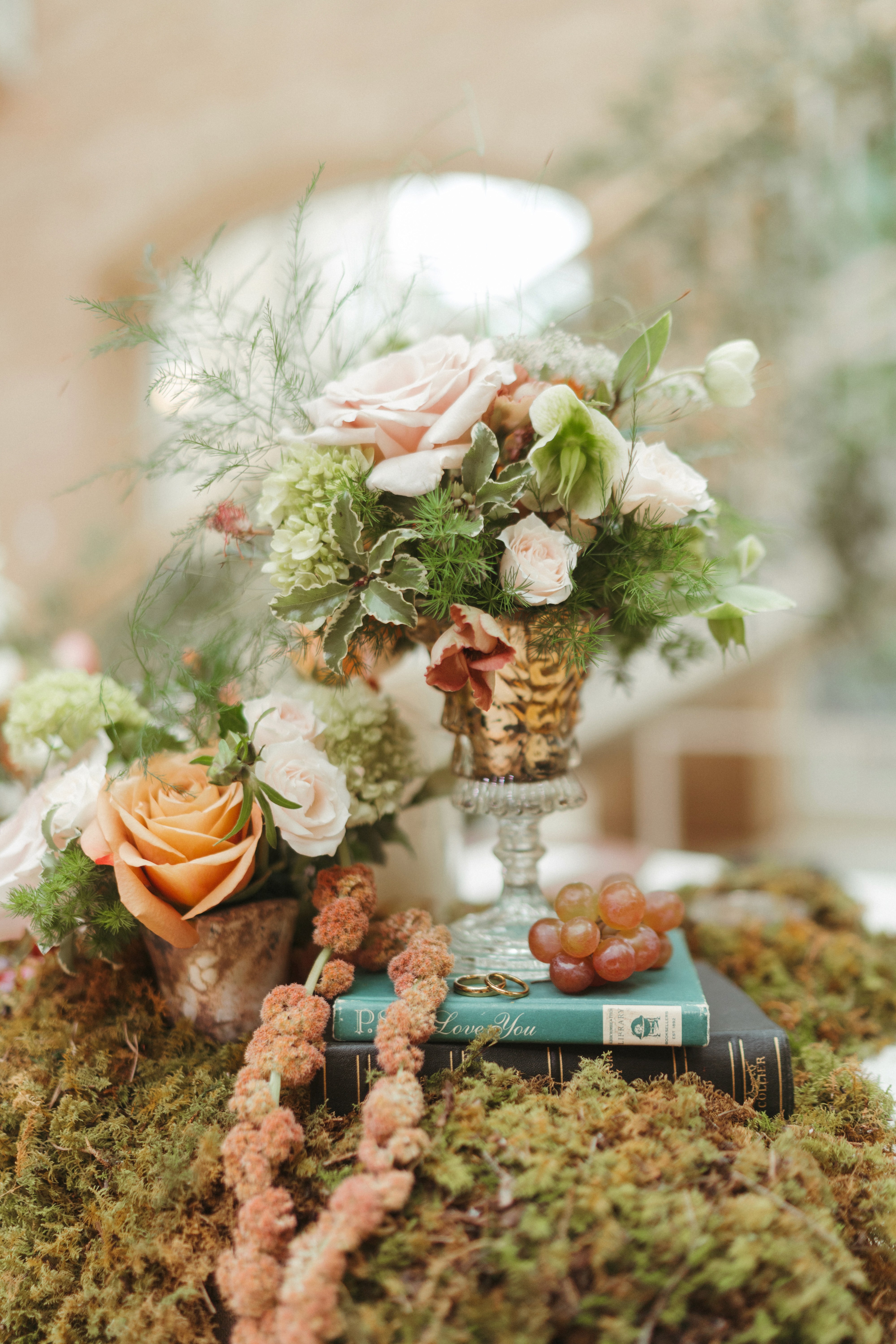a bunch of flowers that are sitting on a table