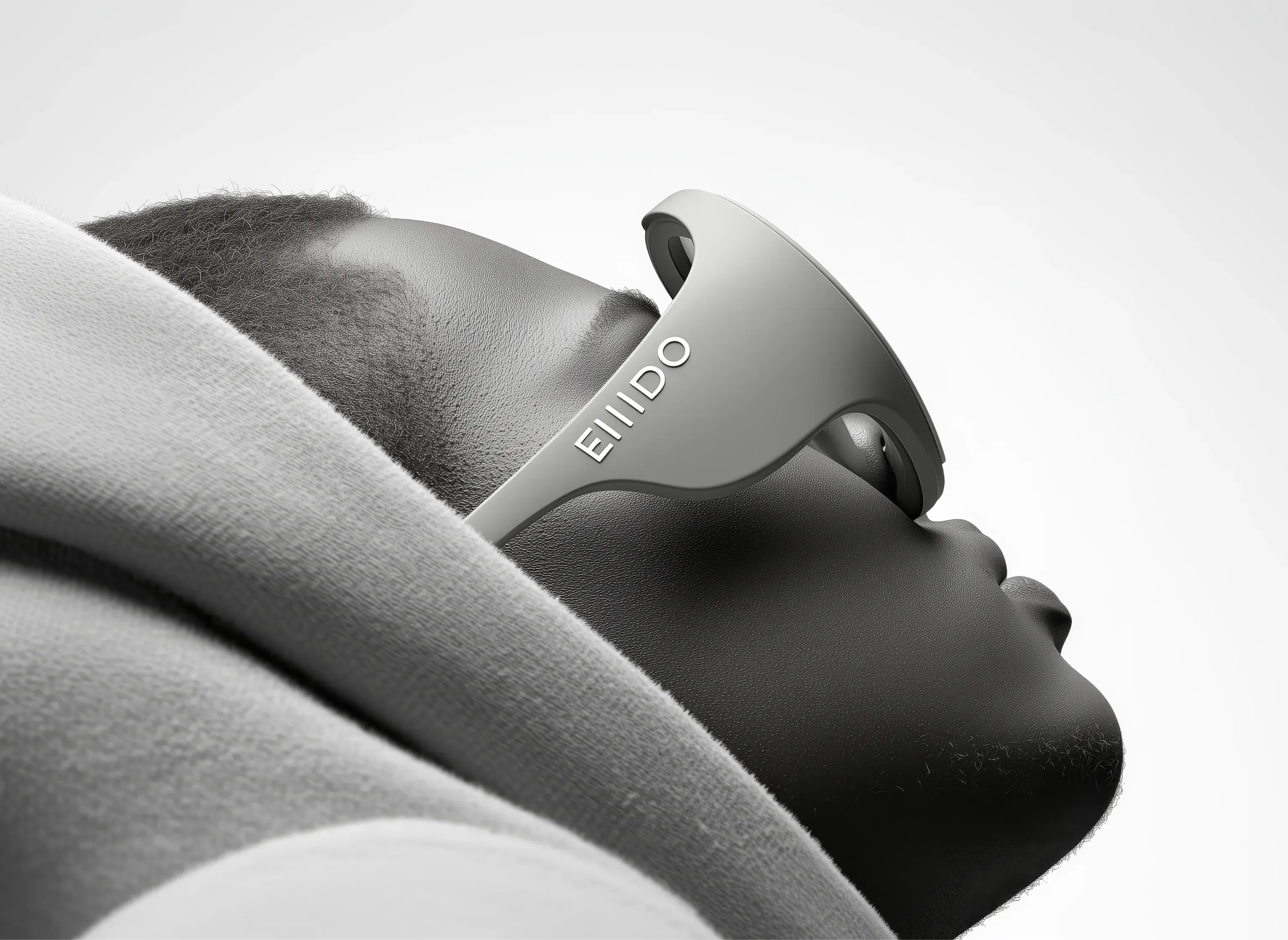 Side profile of a model wearing EIIIDO smart sunglasses in a monochrome setting