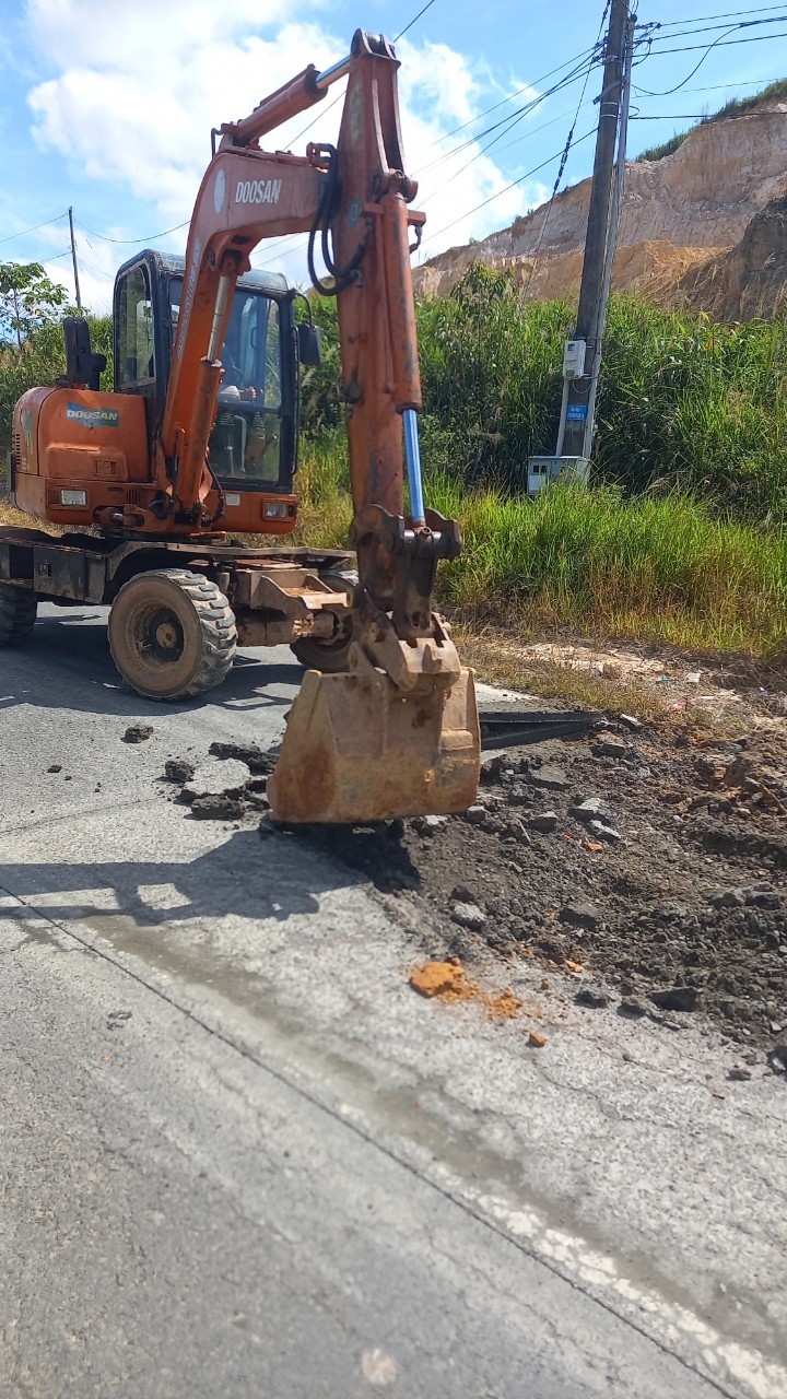 a person digging in the dirt