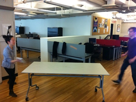 two people getting ready to play table-tennis