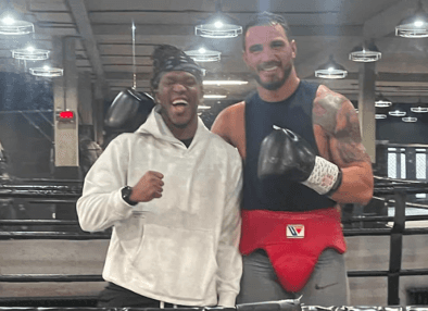 Boxing coach Agron Smakici posing with Olajide Olayinka Williams "JJ" Olatunji, known professionally as KSI after a training session in dubai.