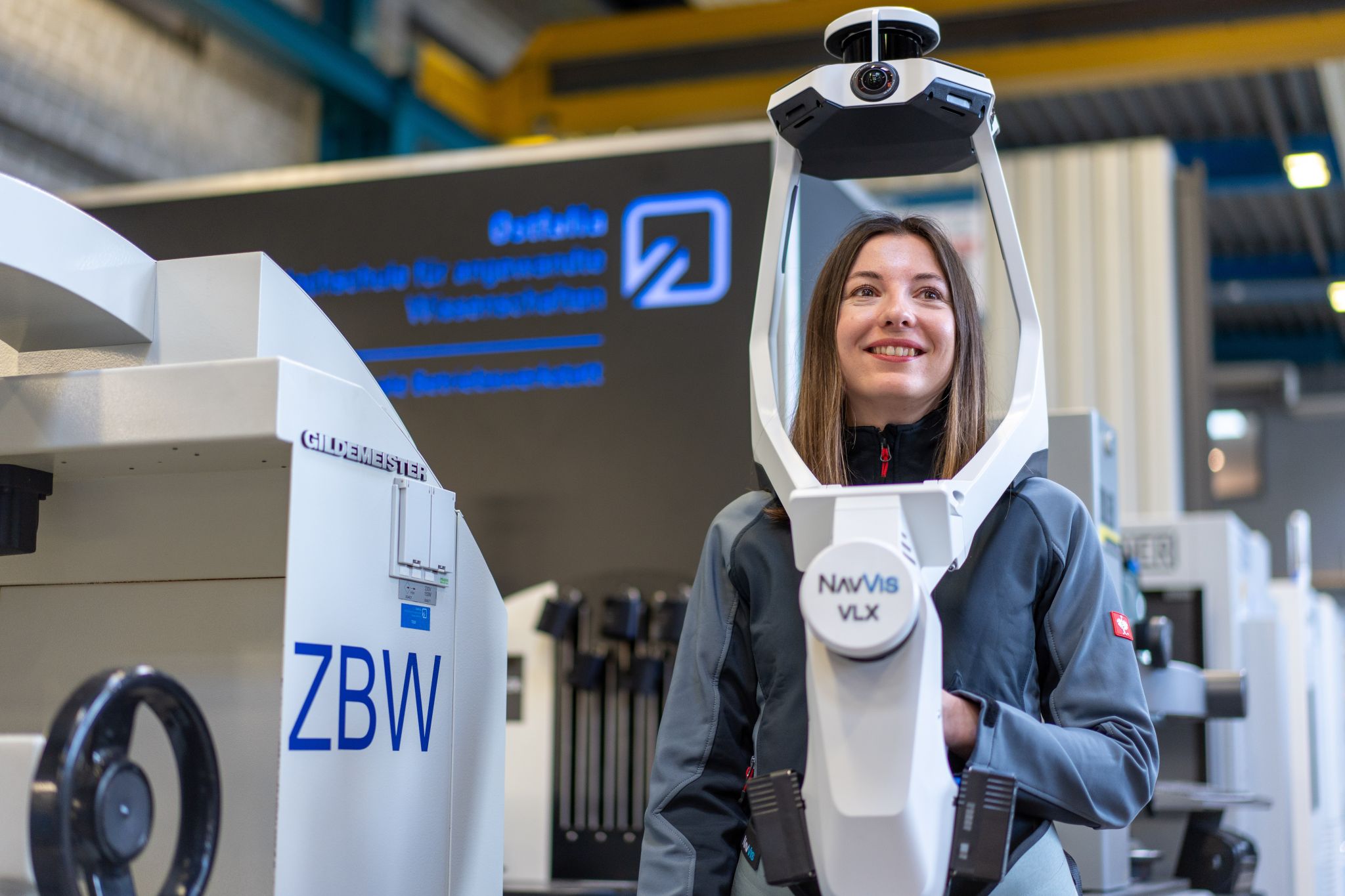 man holding navvis scanner