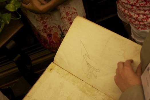 historical book page of an arrow
