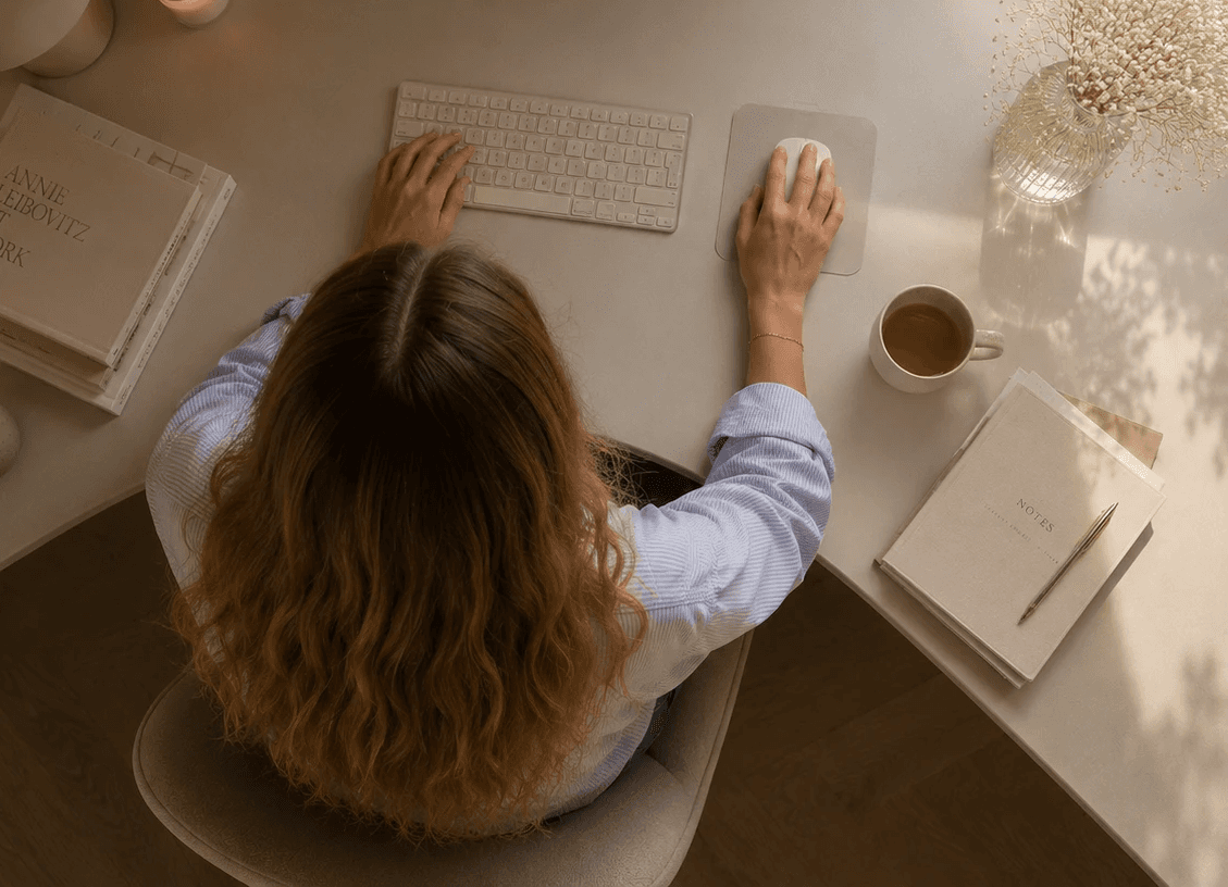 Copywriting sitting at table and smiling