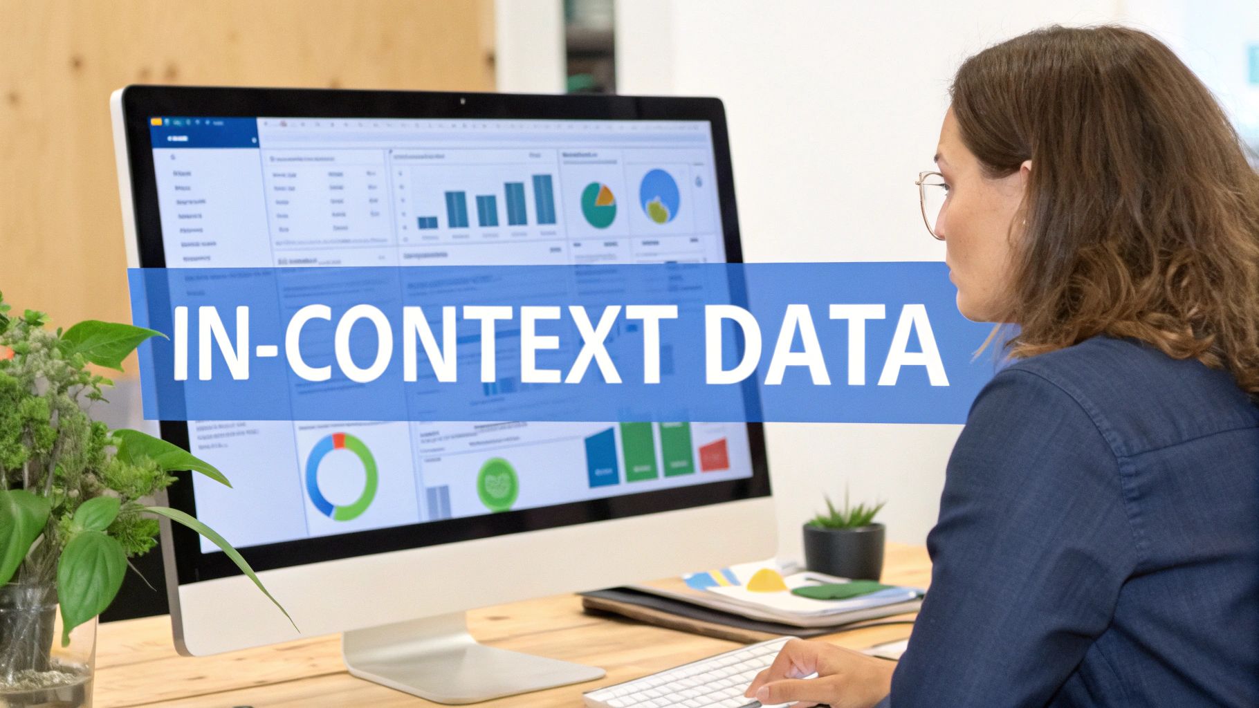 A person interacting with a data dashboard on a large screen