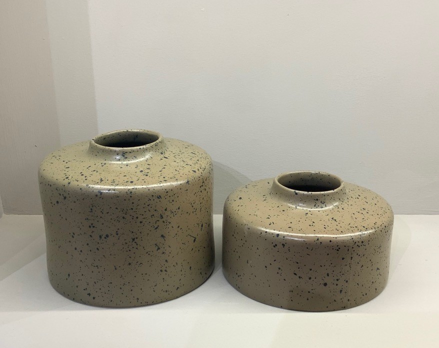 Beige speckled ceramic low-profile decorative vases