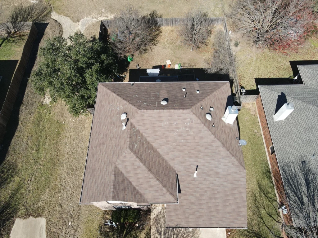 Before: Two-Story Shingle Roof Replacement in San Antonio.