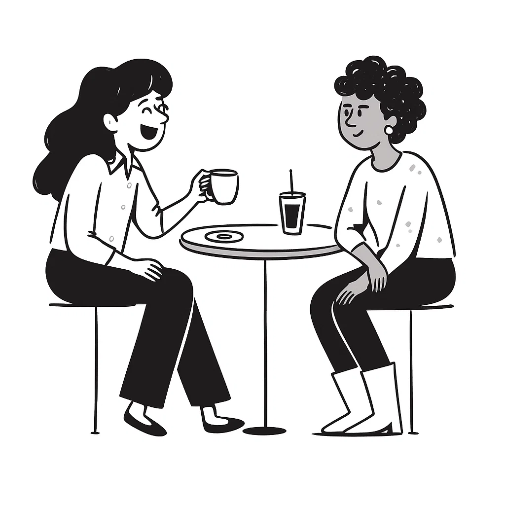 clear drinking glass with coffee on top of white table