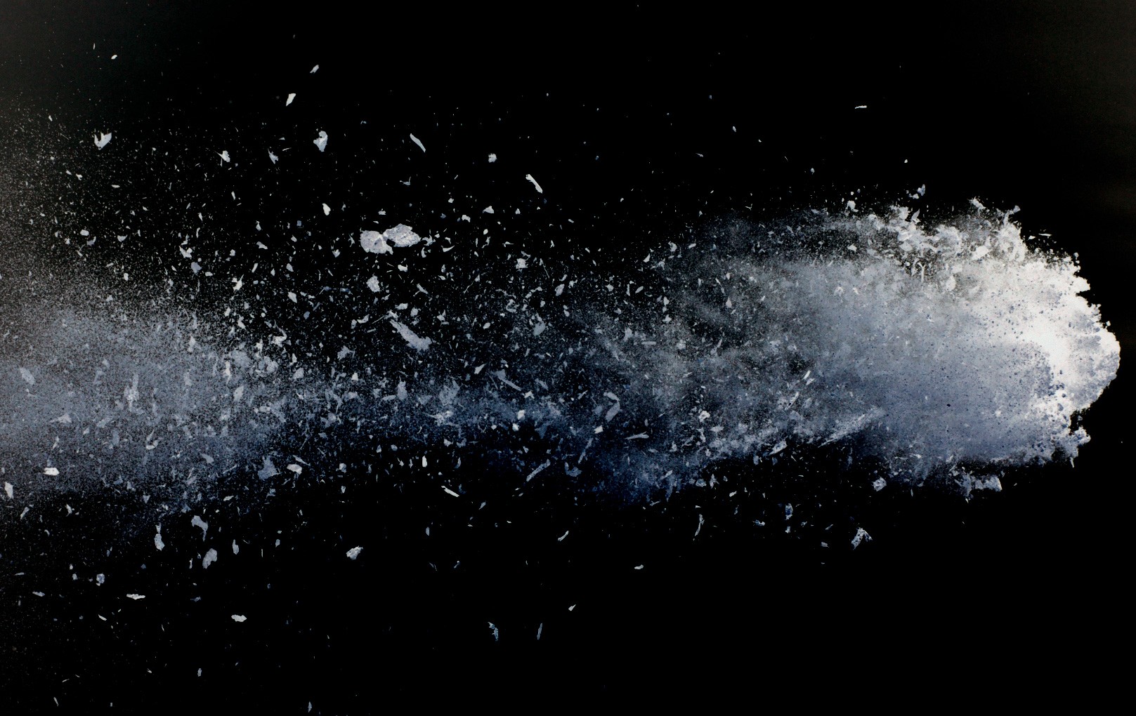 kids lying on a glass land and smiling