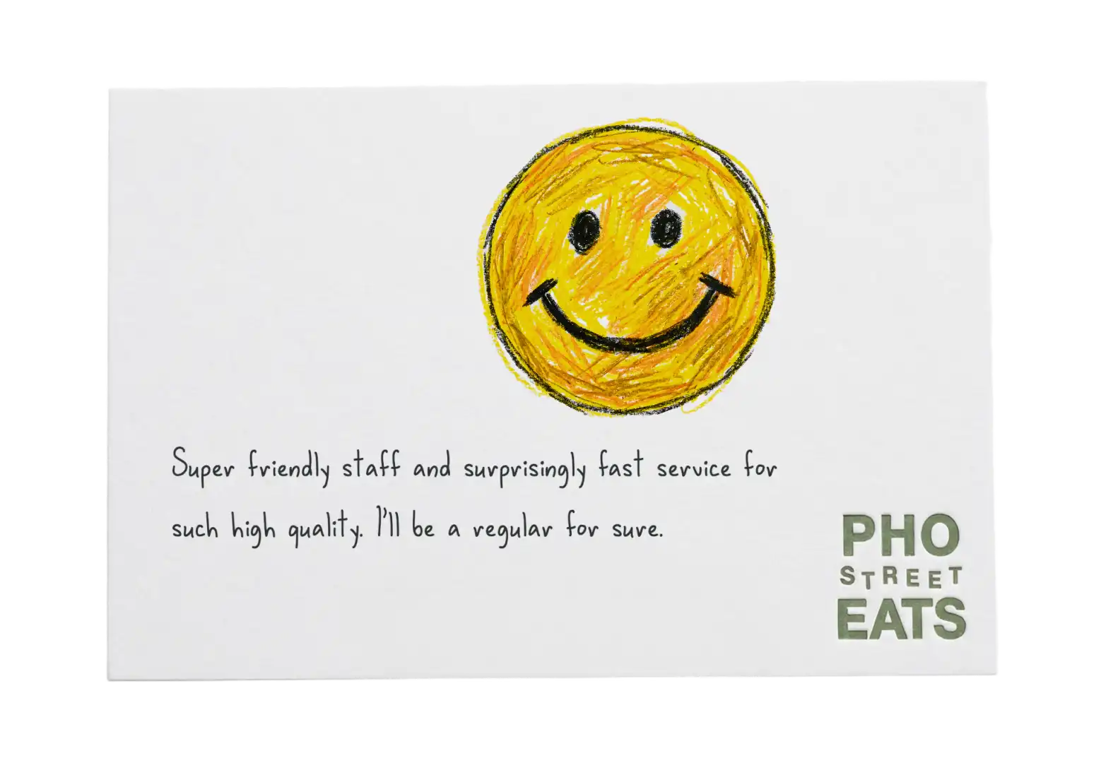 Pho Street Eats review card with a yellow smiley face, praising staff and service.