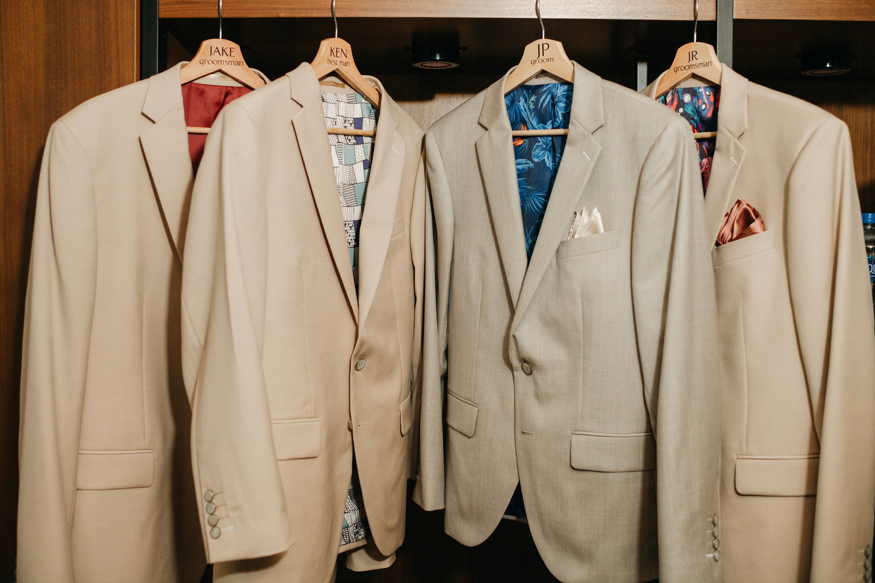 Flat lay wedding details with bouquet, rings, and sparkling bridal heels