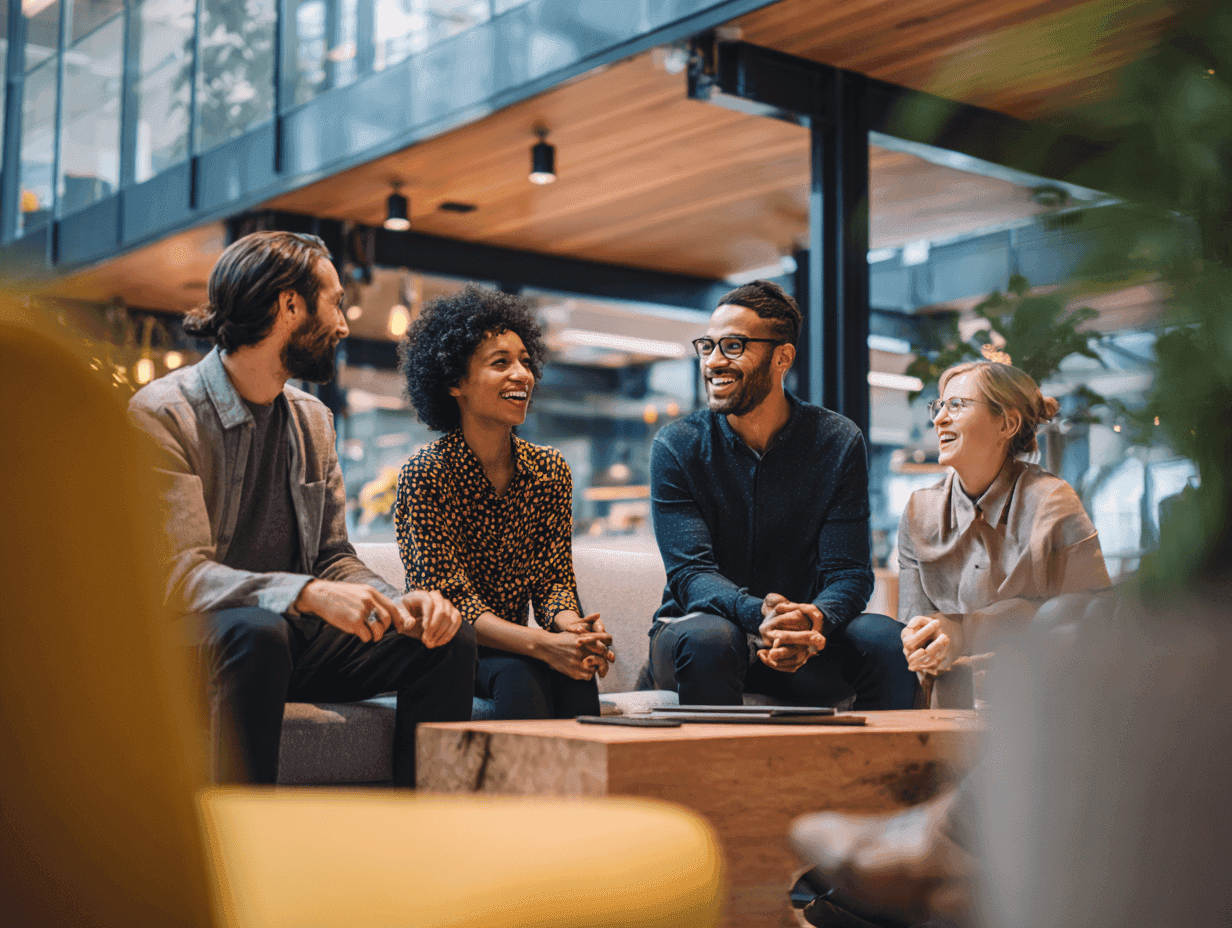 Authentic scene of a diverse team in discussion and mentoring session