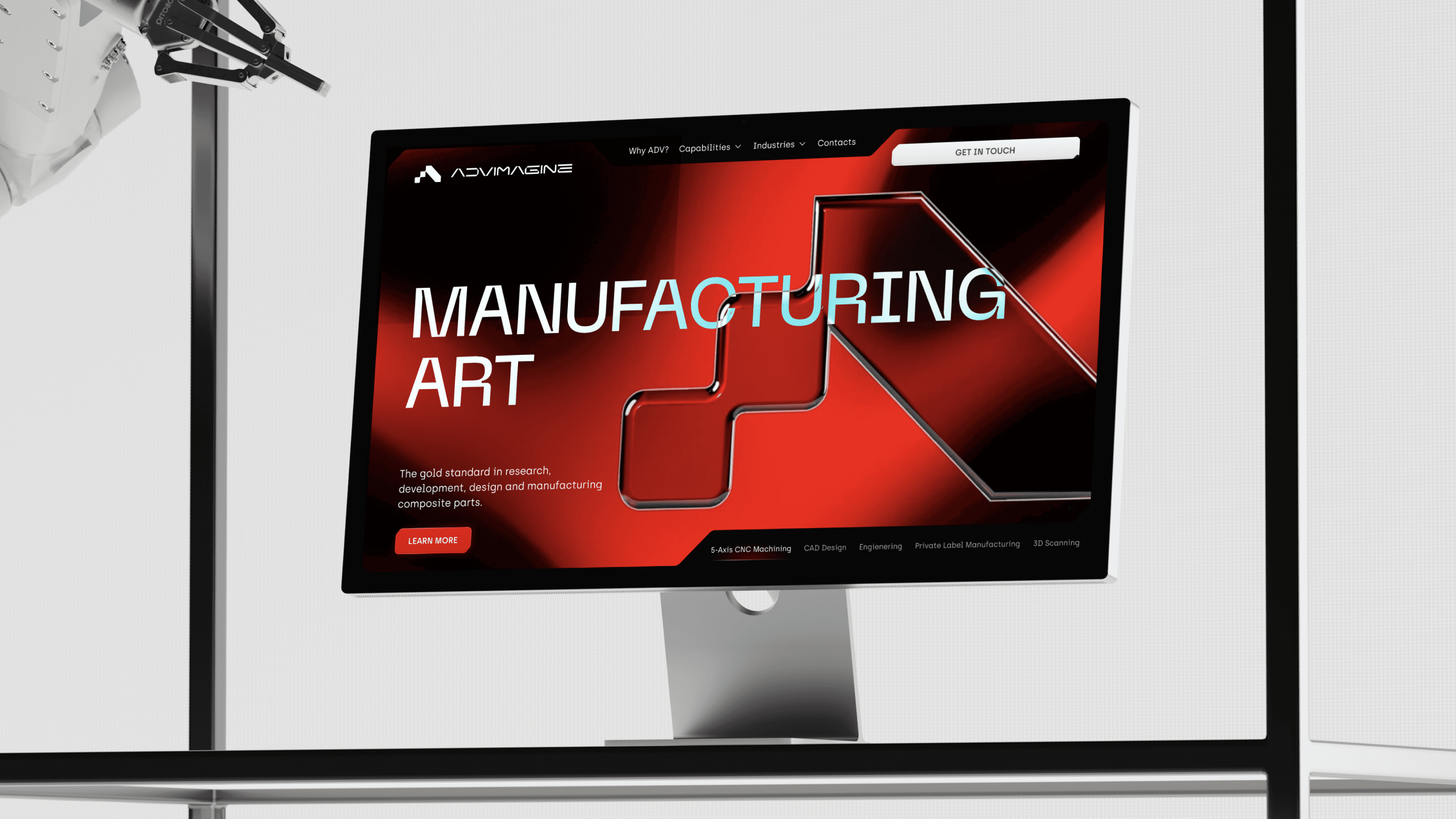 Website hero section on a deep red background with a glossy black 3D arrow mark. Large headline reads "Manufacturing Art," with a subhead about cutting-edge R&D, precision design, and composite manufacturing.