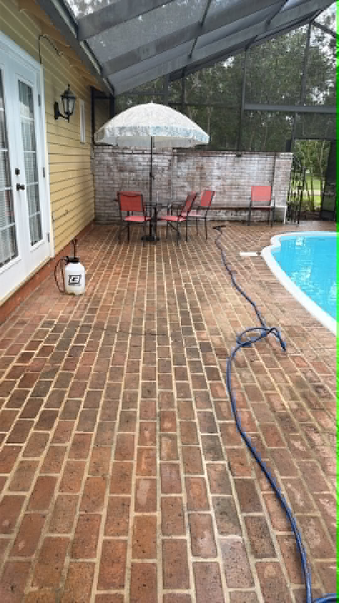 Concrete driveway and carport, washed and rinsed clean.