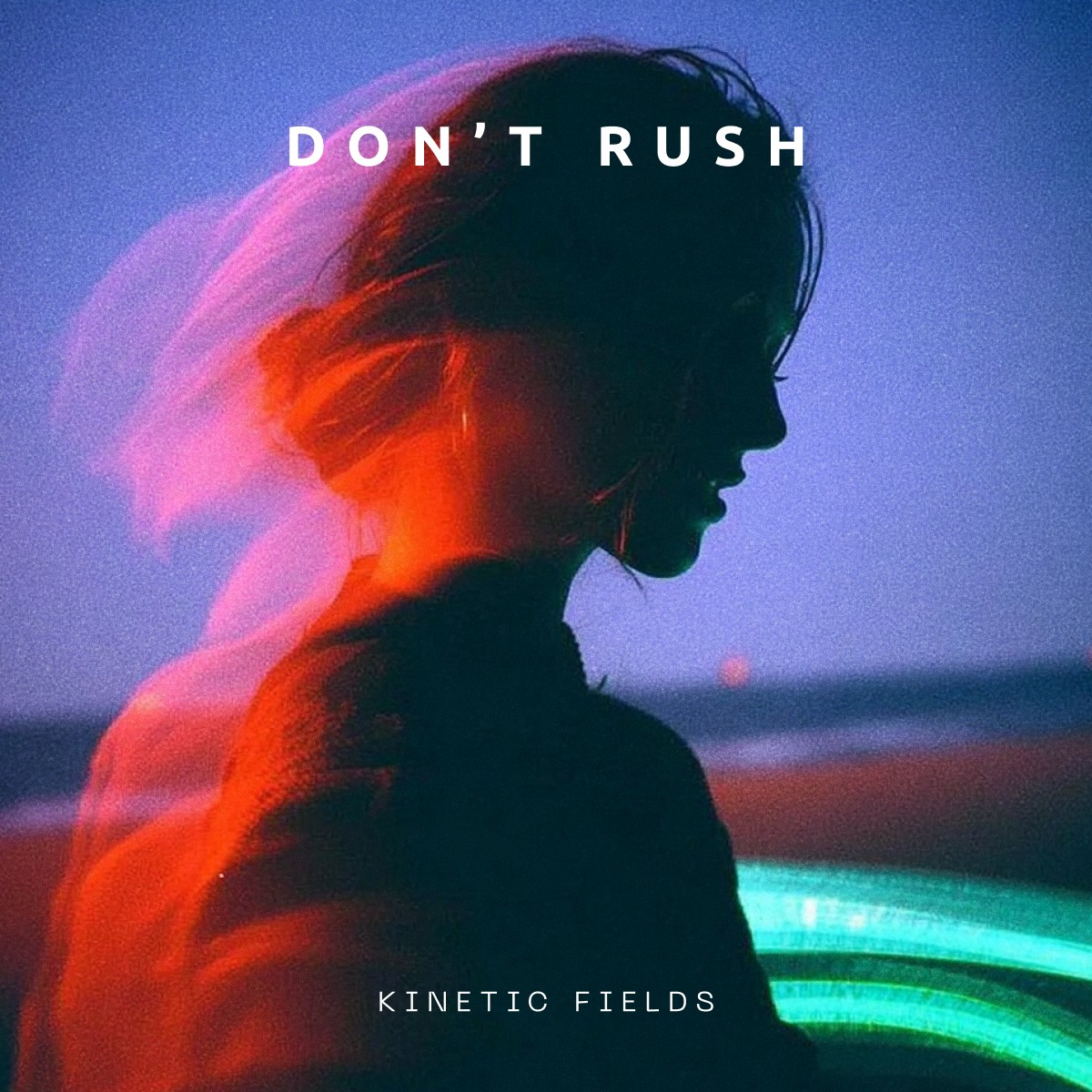 A close-up of a person wearing green-tinted glasses, with a serious expression and smooth skin.