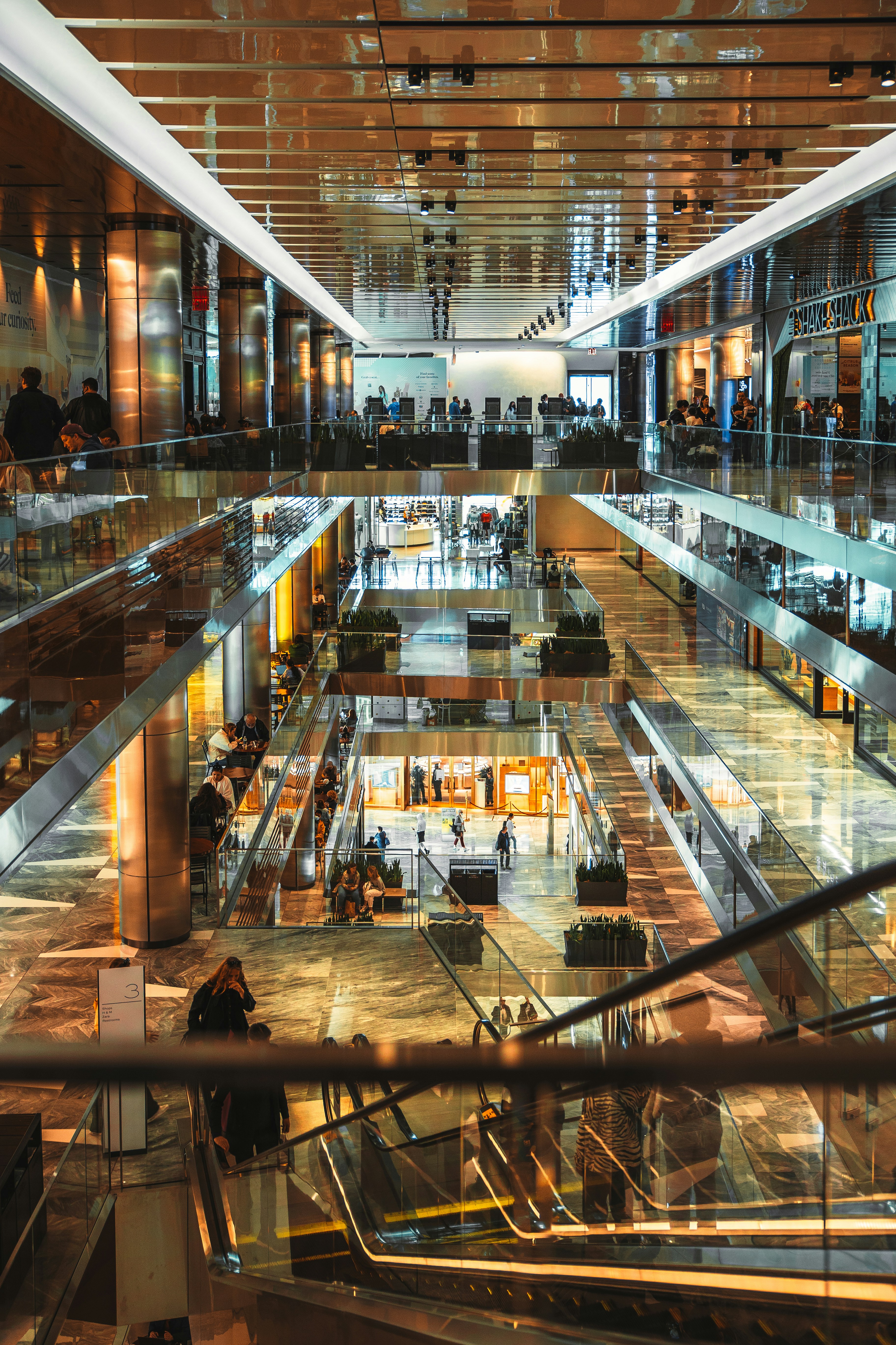 brown wooden beach lounge chair on beach during daytime
