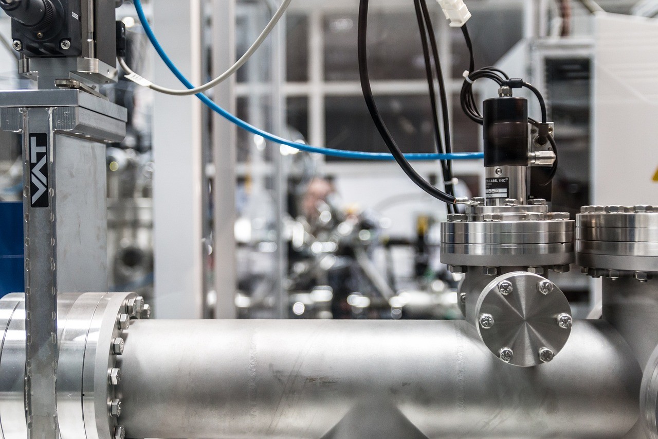 a white building with a blue barrel on top