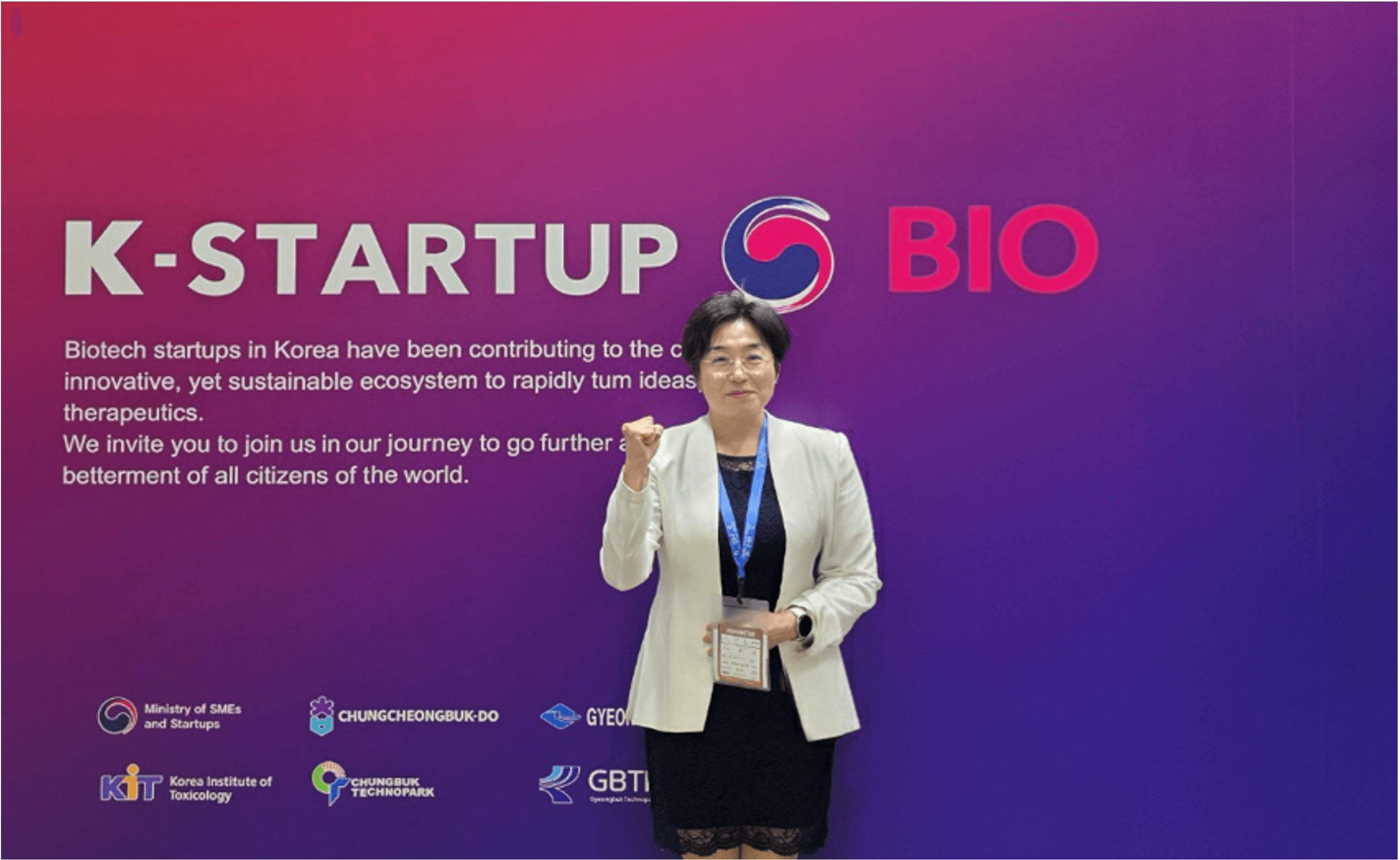 CEO Kang in front of KIT's exhibition booth for K-startups at BioJapan