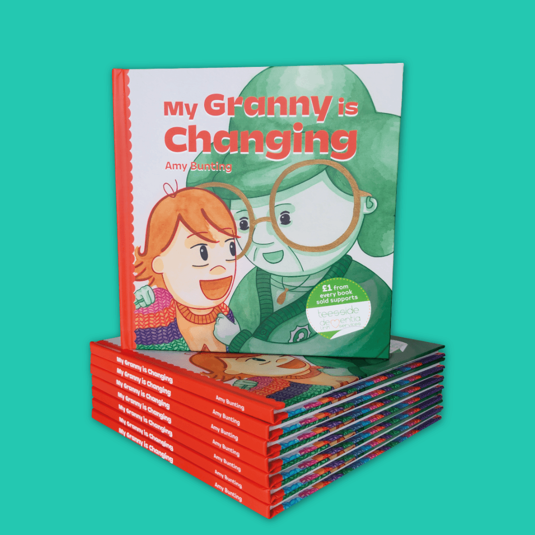 An image of the children's picture book My Granny is Changing. The book is facing forward and sat onto of a stack of the same book. The spines are orange, and the title on the front of the book is big and orange too.