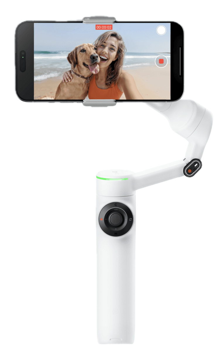 iPhone 15 Silicone Case with MagSafe in Cypress, embedded Apple logo in centre, attached to iPhone 15 Blue finish, seen through camera cut-out.