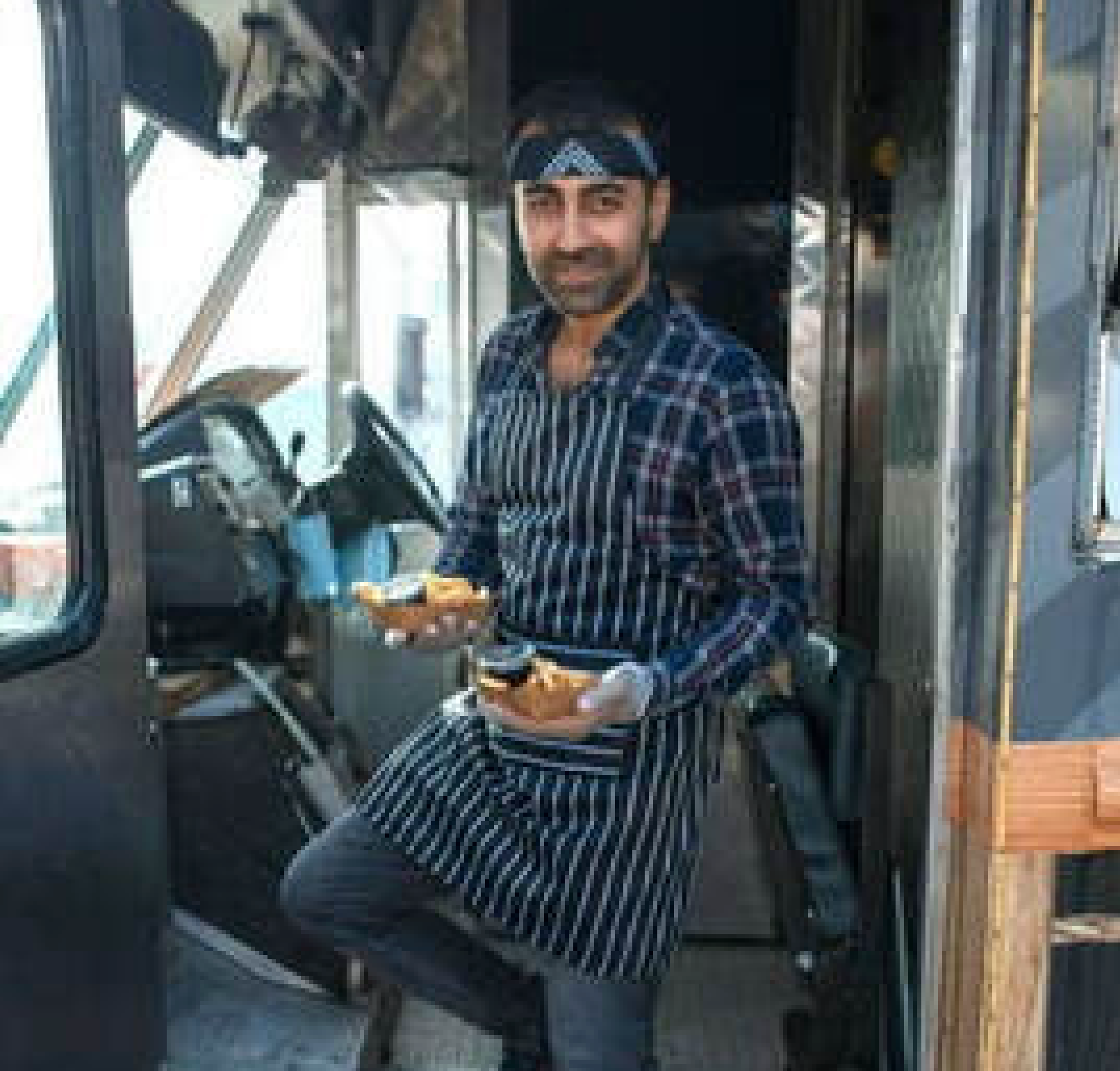 Aldelo ePay male clerk using it in front of a customer.