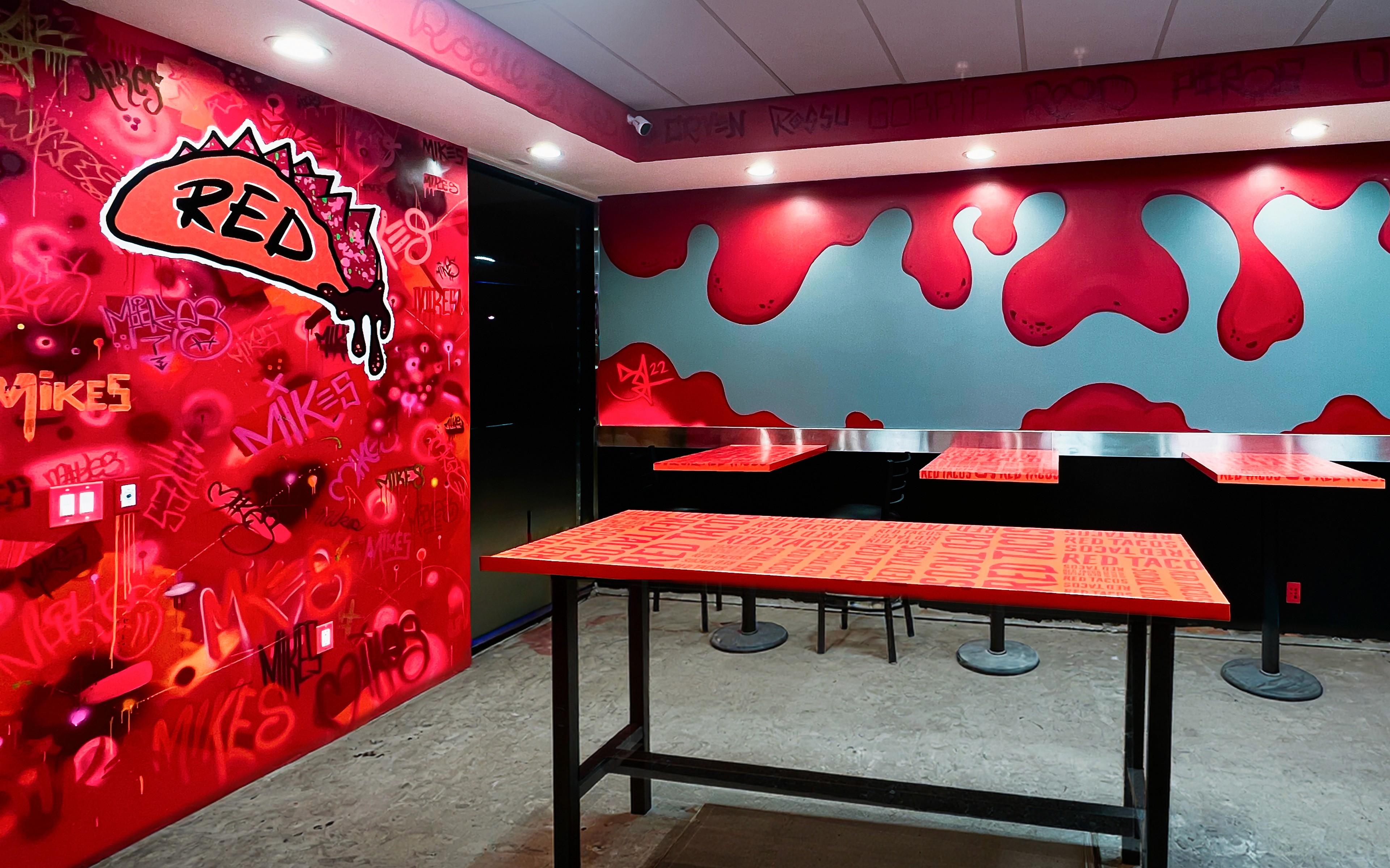 Mike’s Red Tacos dining area with red painted interior mural system — San Diego, CA (2023)