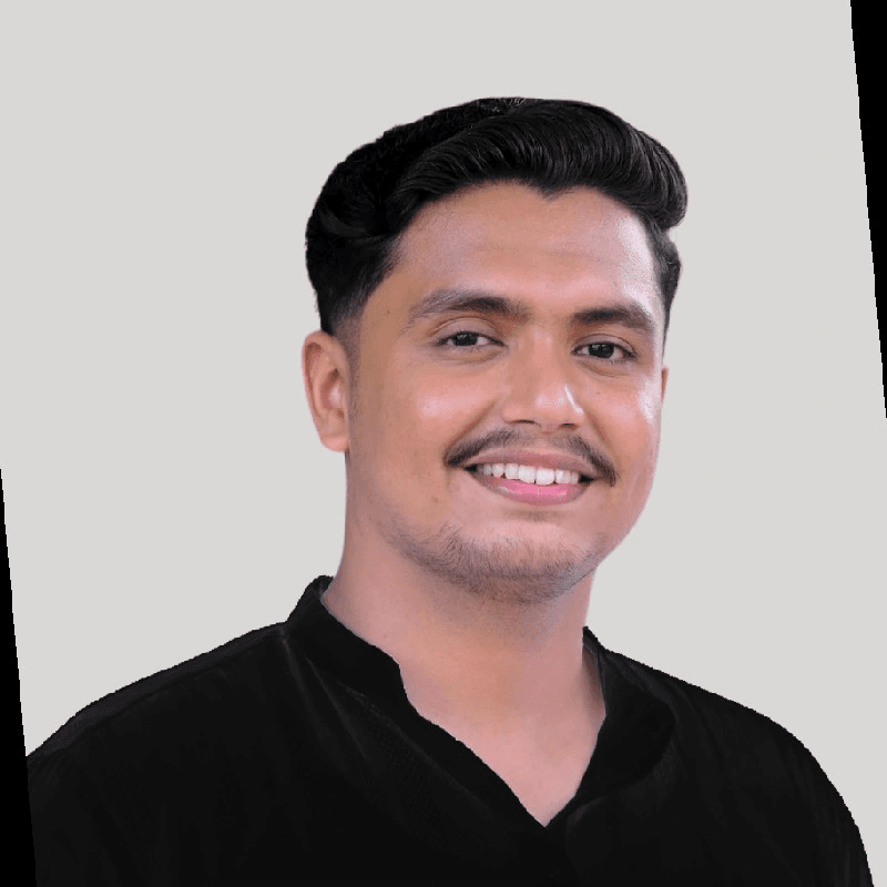 smiling woman wearing white and black pinstriped collared top