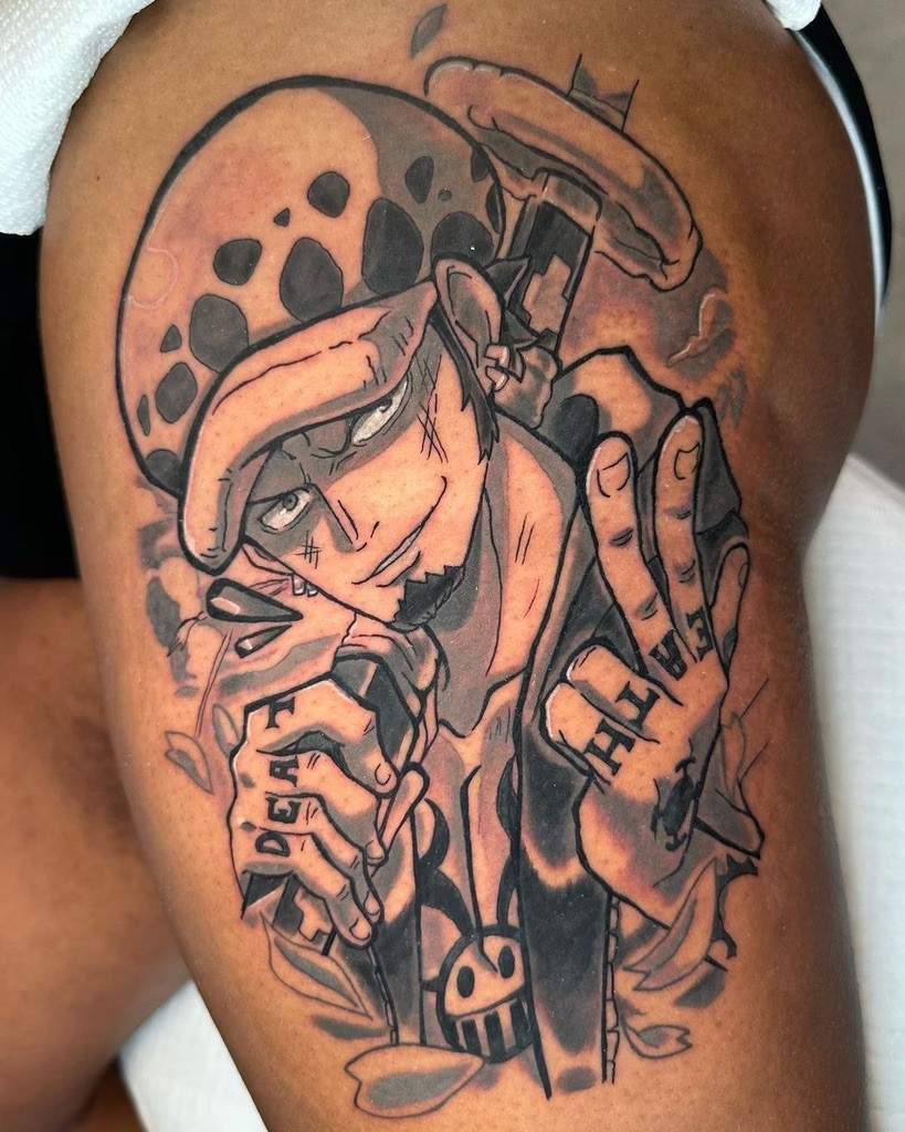 A monochromatic tattoo of Trafalgar D. Water Law from One Piece, capturing his confident smirk and signature hat. The design emphasizes sharp contrasts and intricate details, including his tattooed fingers spelling "DEATH," framed by subtle shading and a mysterious atmosphere.