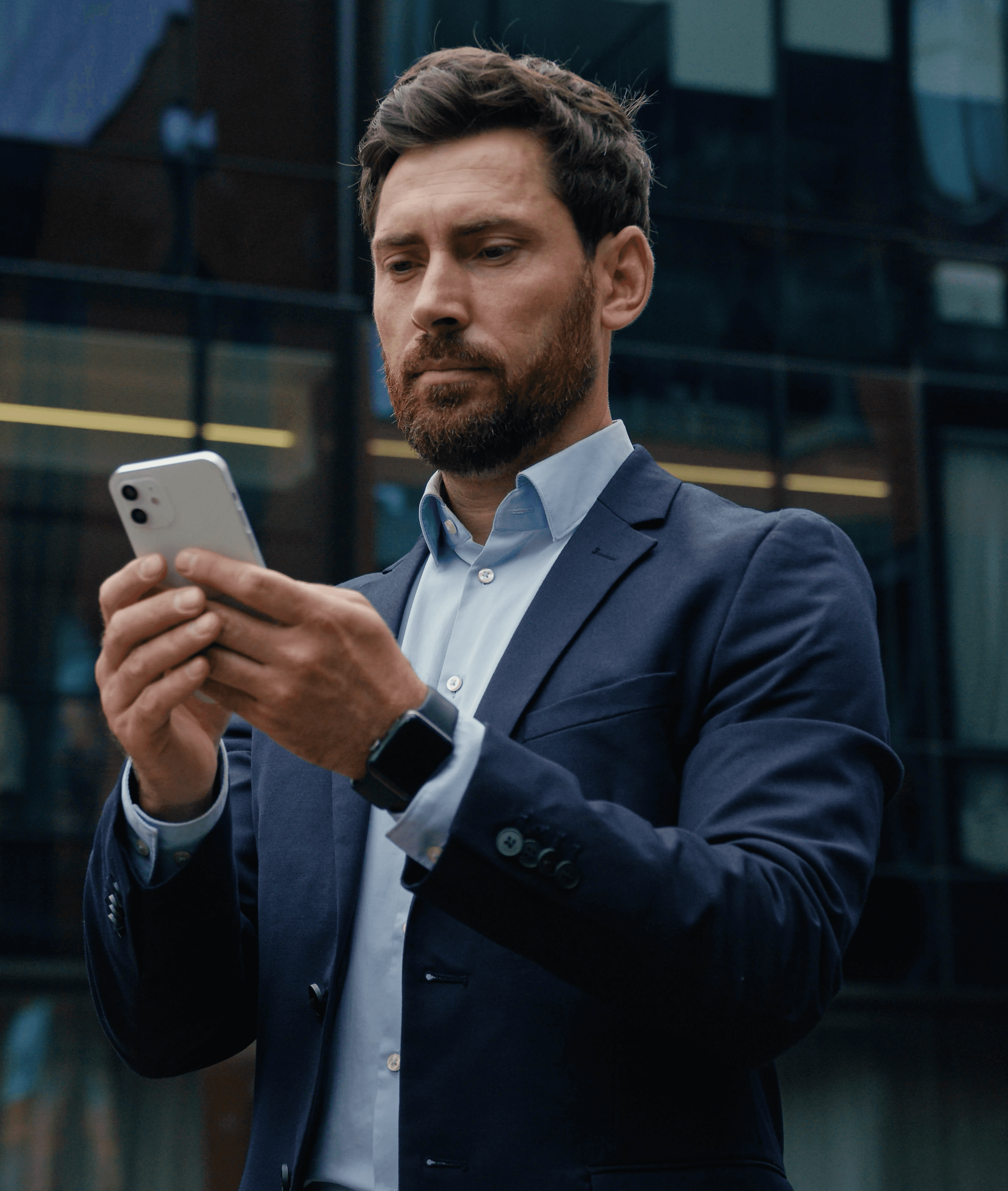 Woman smiling at orange smartphone.